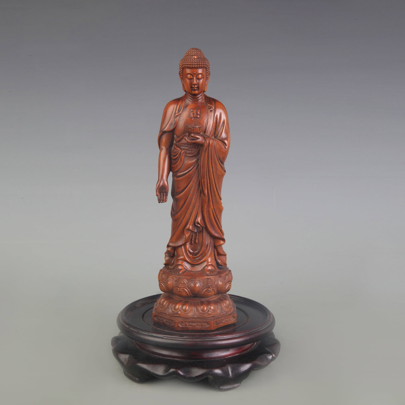 A FINE SMALL BOXWOOD MADE GAUTAMA BUDDHA STATUE: Qing Dynasty; High: 8.1 inch. Wooden base for picture and display only.