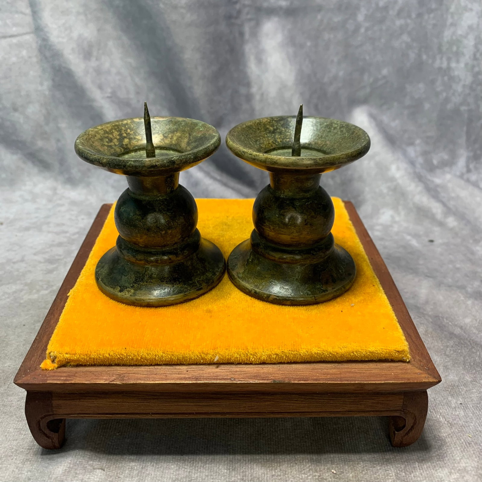 REPUBLIC OF CHINA BRONZE CANDLESTICKS (1 PAIR): Republic Period; High: 3.2 inch; Diameter:2.6 inch; Wooden base for picture and display only.