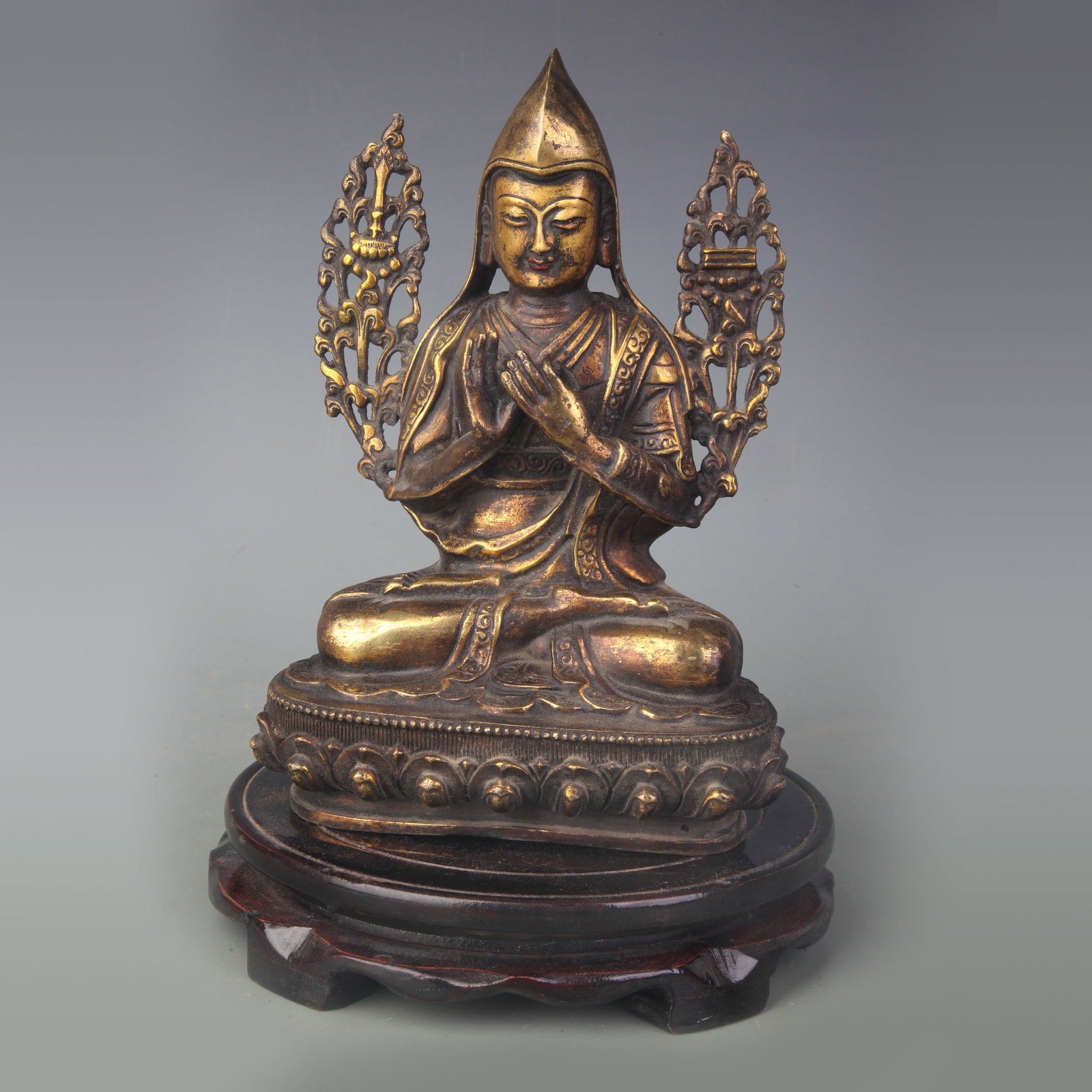 A GILT BRONZE FIGURE OF TSONGKHAPA: Qing Dynasty; High: 8.2 inch; Wooden base for picture and display only.