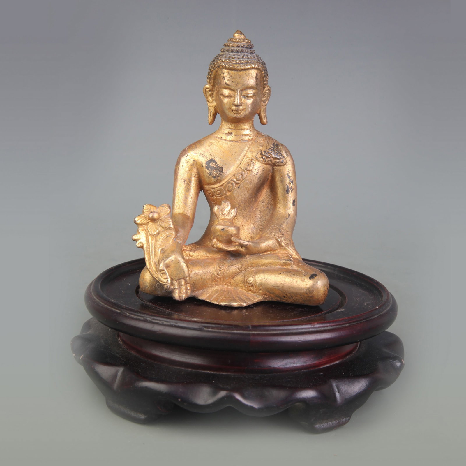 A SMALL BRONZE FIGURE OF MEDICINE BUDDHA: 20th Century; High: 4.0 inch; Wooden base for picture and display only.