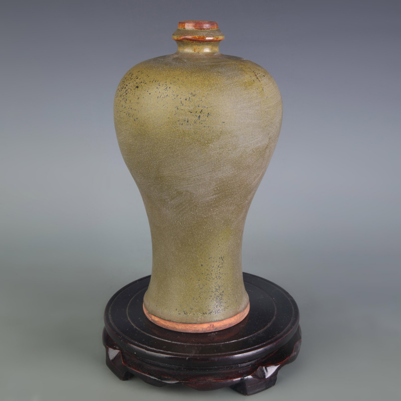 AN EEL-YELLOW GLAZED MEIPING PORCELAIN VASE: Ming Dynasty Style; High: 9.7 inch; Wooden base for picture and display only.
