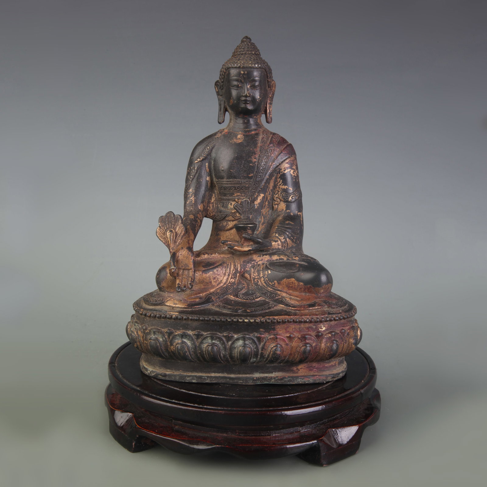 A FINE BRONZE FIGURE OF MEDICINE BUDDHA: 20th Century; High: 8.1 inch; Wooden base for picture and display only.