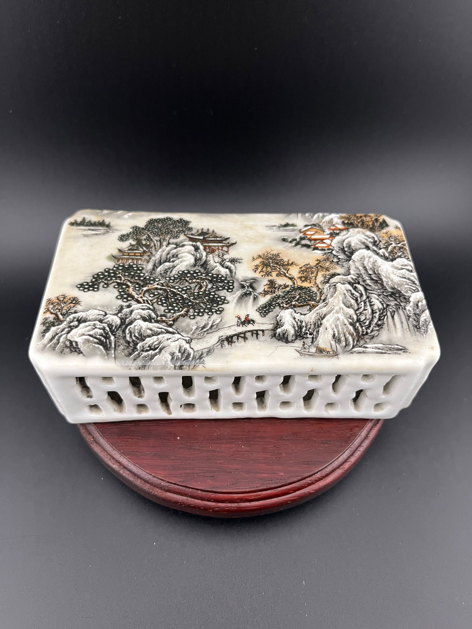FAMILLE ROSE LANDSCAP PAINTING PORCELAIN INK REST: Republic Period; Long: 5.2 inch; Width: 2.8 inch; High: 1.4 inch. Wooden base for picture and display only.