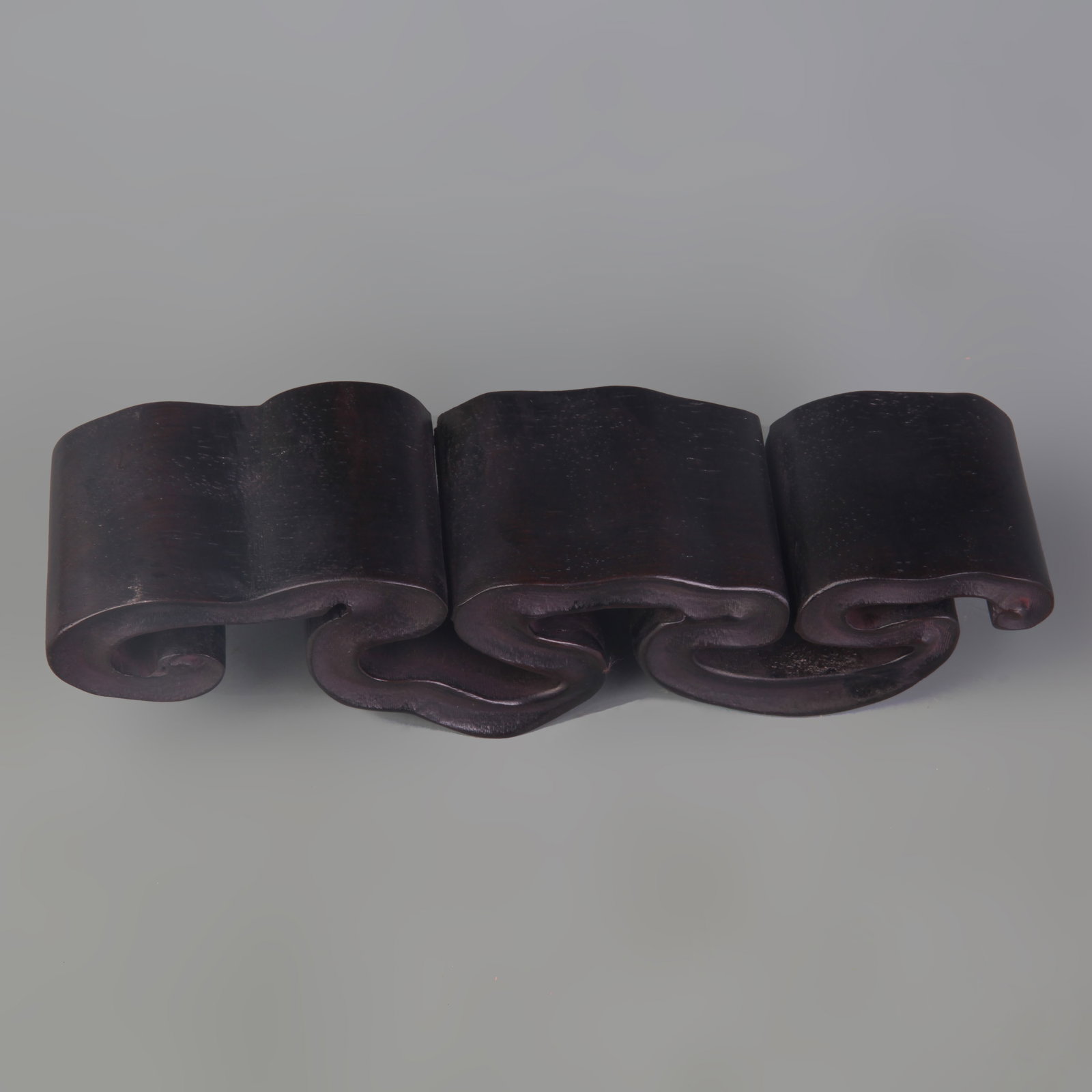 A ZITAN ROSEWOOD MADE INK REST: Modern; Long: 7.0 inch; Width: 1.8 inch; High: 1.8 inch; Wooden base for picture and display only.