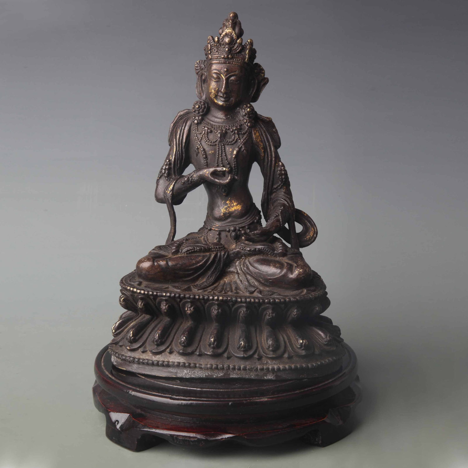 A FINE BRONZE TIBETIAN VAJRASATTVA STATUE: Qing Dynasty; High: 8.7 inch. Wooden base for picture and display only.