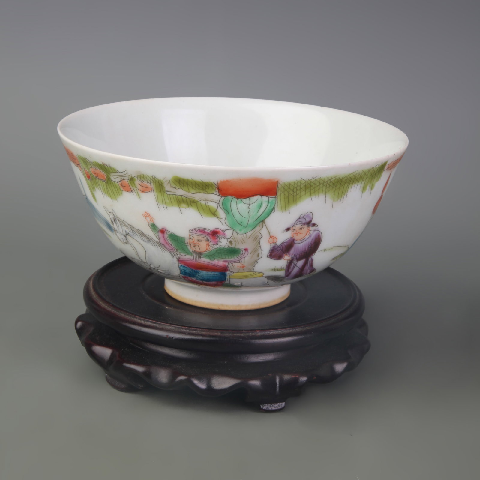 A FINE FAMILLE ROSE FIGURE BOWL: Qing Dynasty Guang Xu Period; Diameter: 5.9 inch; High: 2.7 inch; Wooden base for picture and display only.