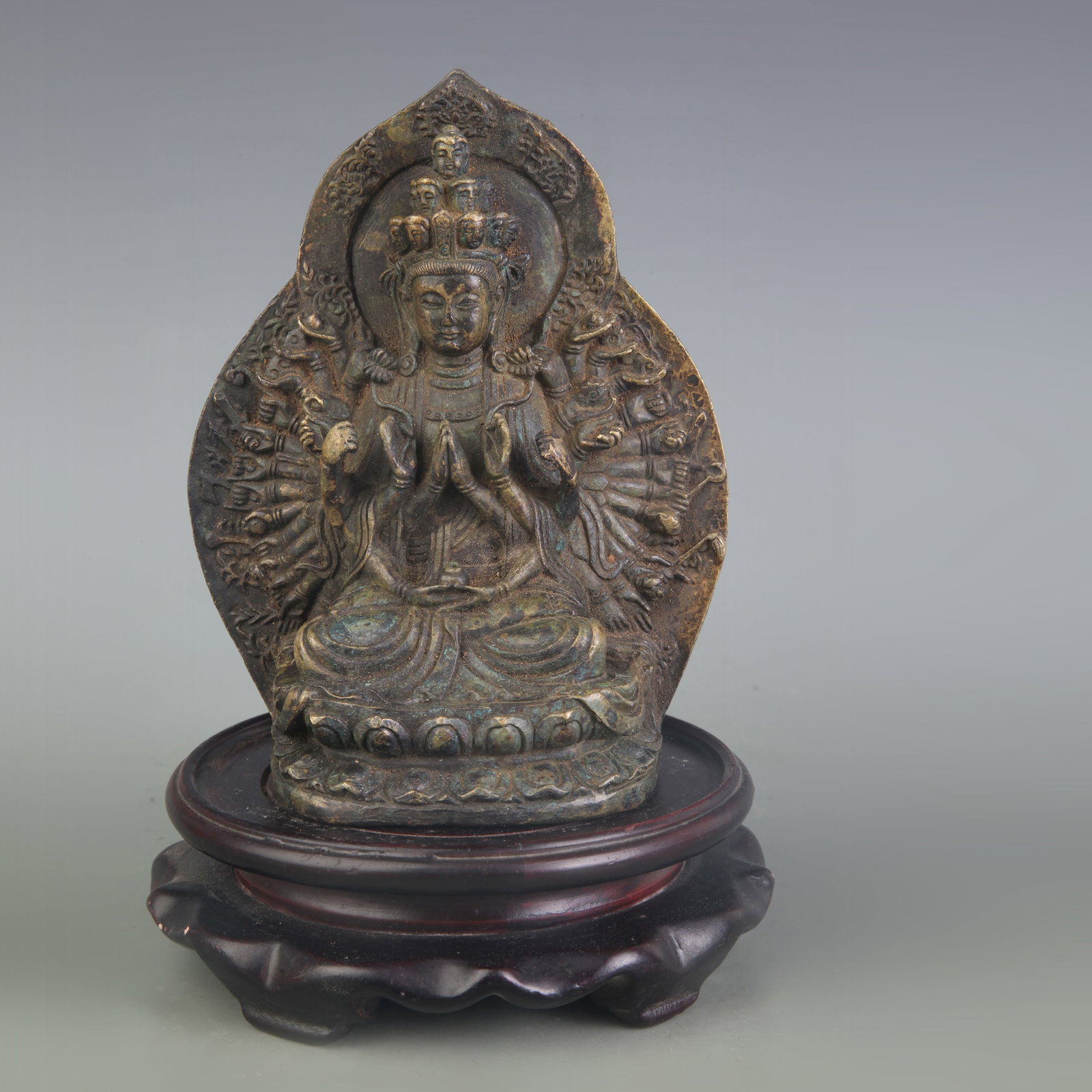 A BRONZE THOUSAND-ARMED GUANYIN FIGURE: Qing Dynasty; High: 5.7 inch; Wooden base for picture and display only.
