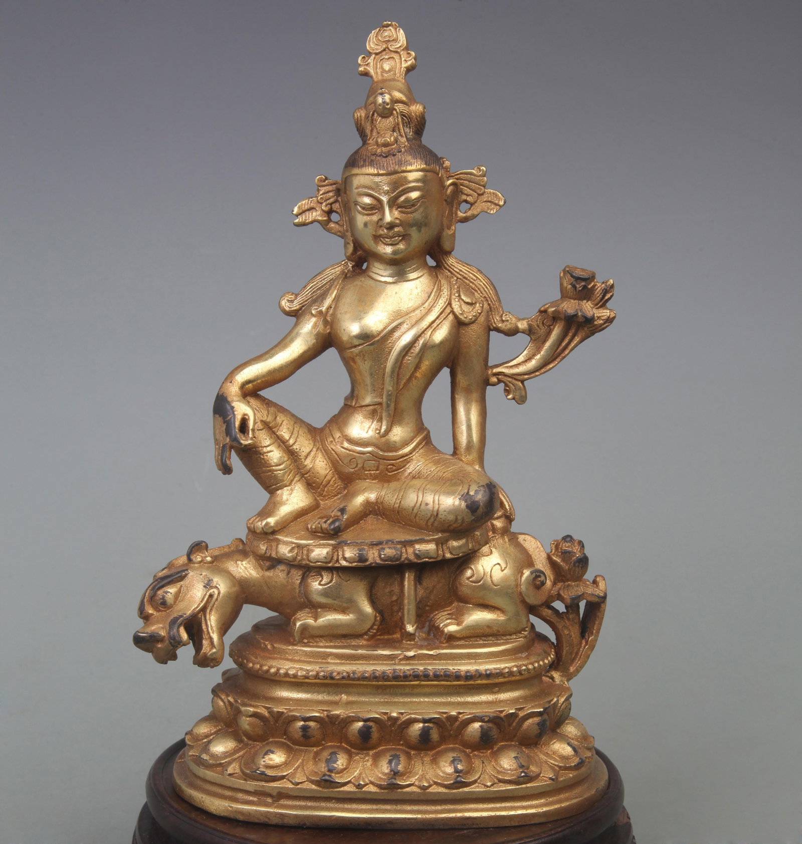 A FINE BRONZE MANJUSHRI BODHISATTVA STATUE: Ming Dynasty Style; Diameter: 5.0 inch; High: 8.3 inch. Wooden base for picture and display only.