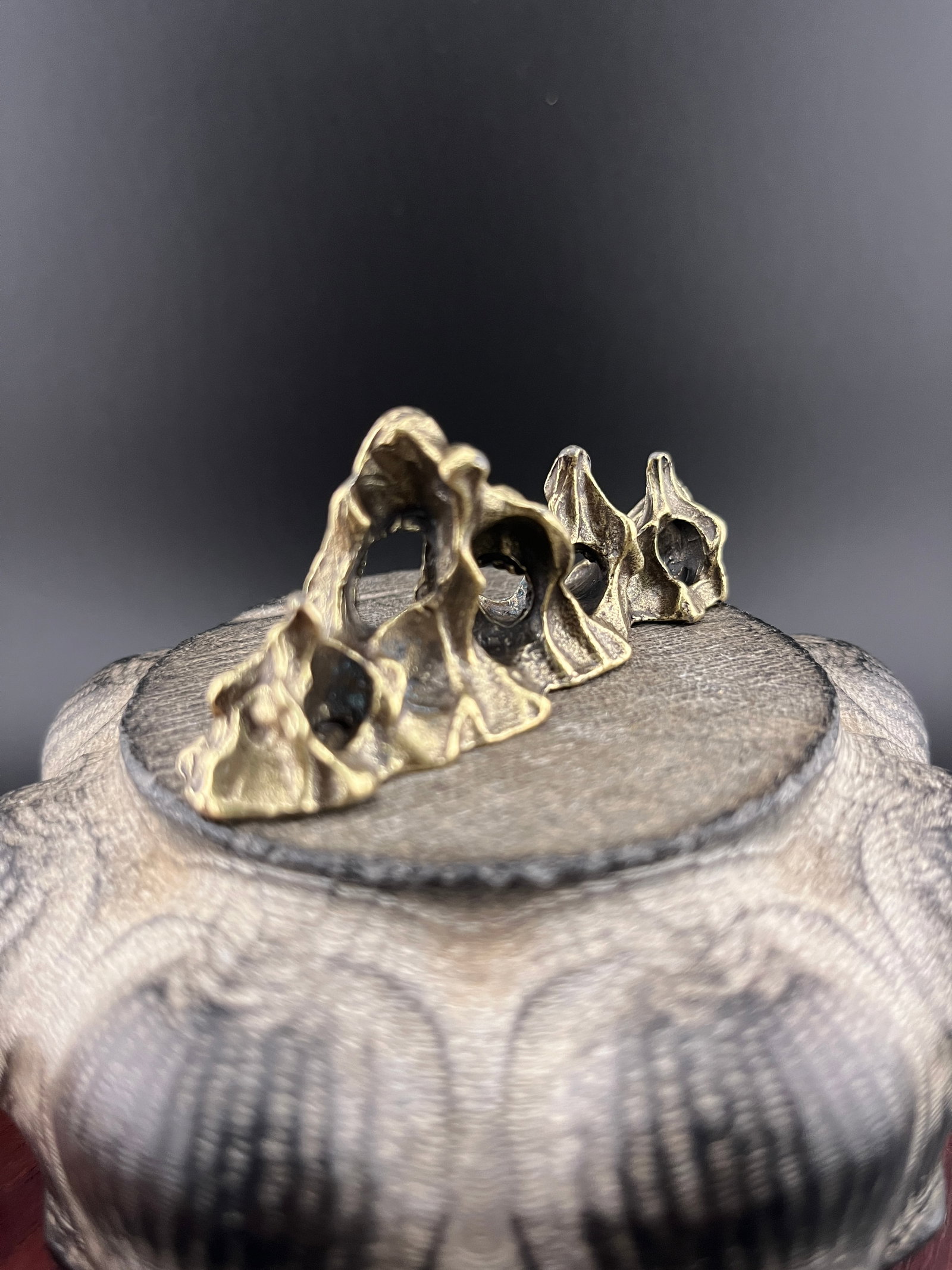 A SMALL BRONZE MOUNTAIN FIGURE - 2