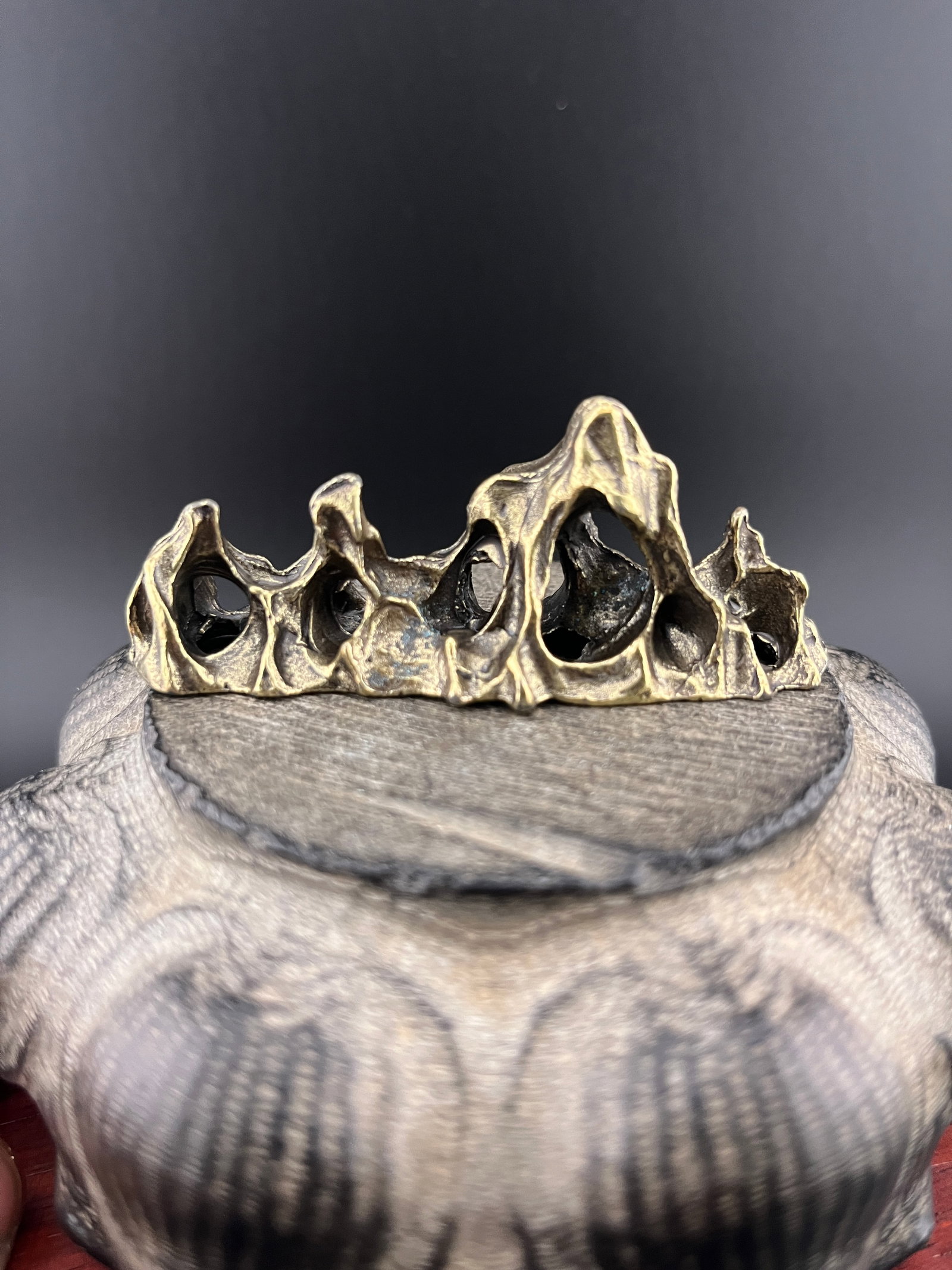 A SMALL BRONZE MOUNTAIN FIGURE - 5