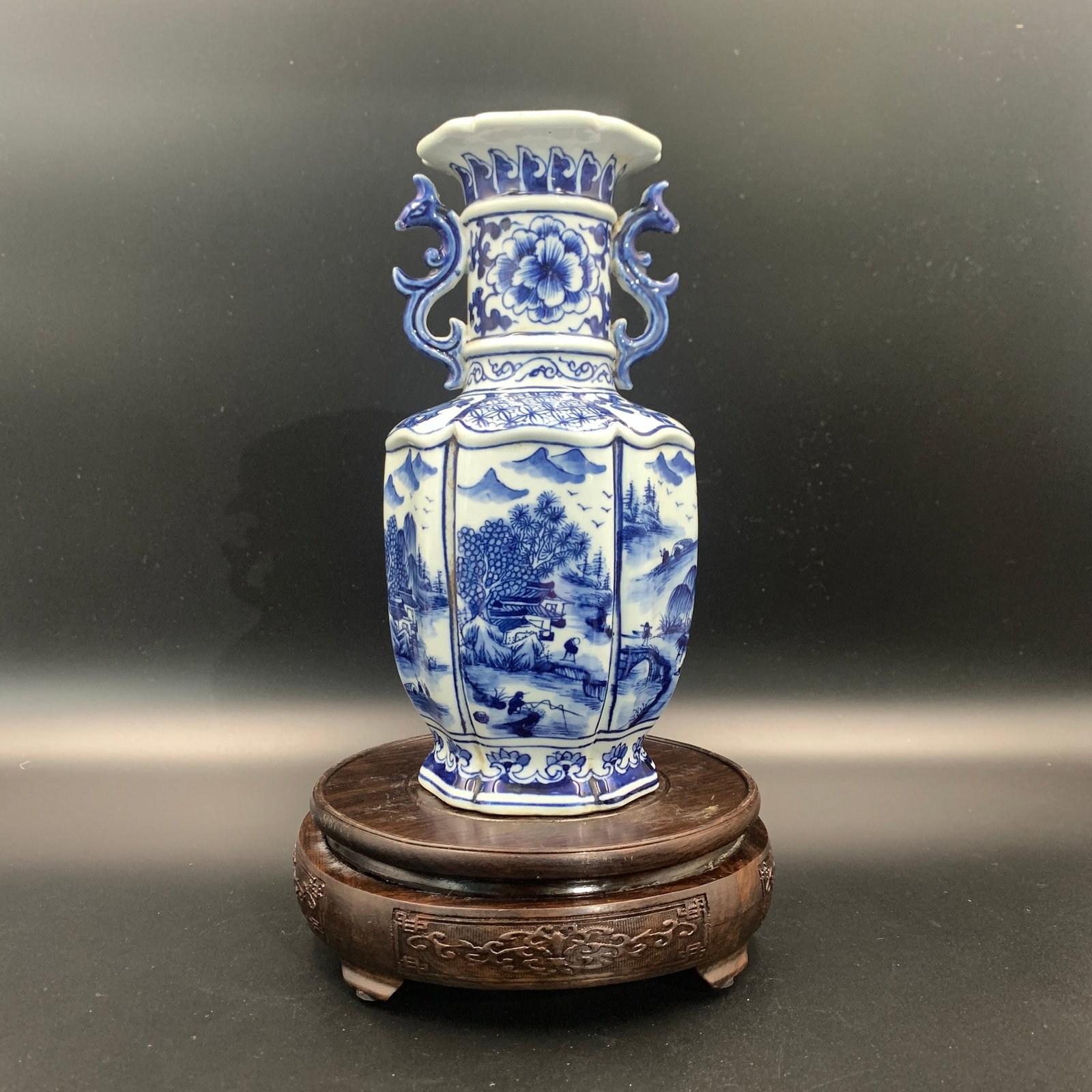 BLUE AND WHITE LANDSCAPE PAINTING PORCELAIN VASE: Qing Dynasty; High: 8.7 inch; Diameter: 4.3 inch. Wooden base for picture and display only.