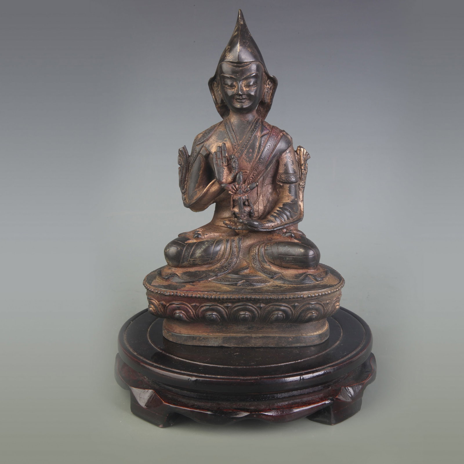 A BRONZE FIGURE OF TSONGKHAPA STATUE: 19 Century; Width: 5.0 inch; High: 8.2 inch; Wooden base for picture and display only.