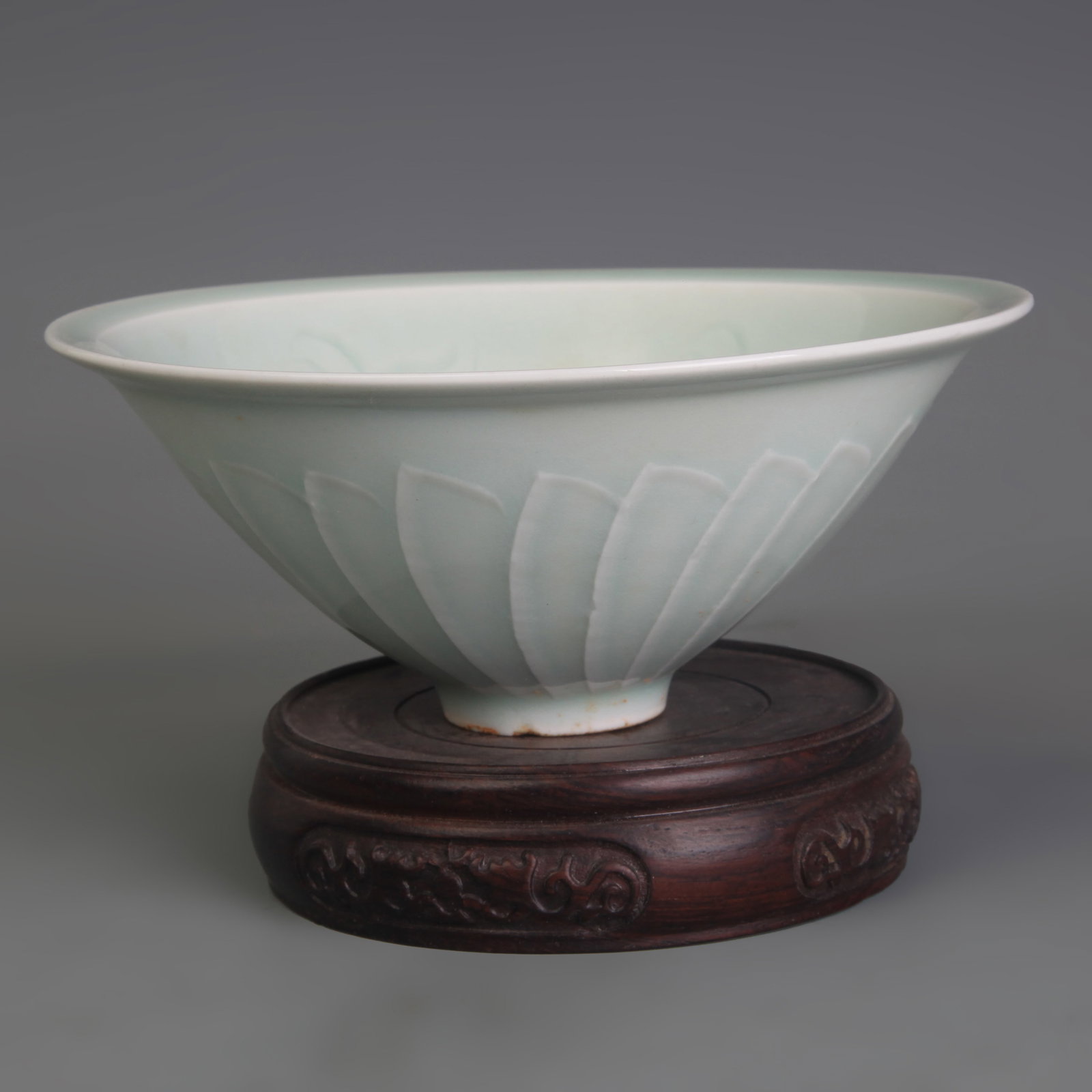 A CELADON “DOU LÌ?? PORCELAIN BOWL: Song Dynasty Style; Diameter: 6.1 inch; High: 2.4 inch; Wooden base for picture and display only.