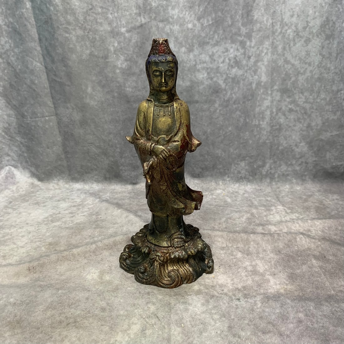 A FINE BRONZE STANDING GUANYIN STATUE: Qing Dynasty; Long: 4.8 inch; Width: 4.3 inch; High: 10.9 inch. Wooden base for picture and display only.