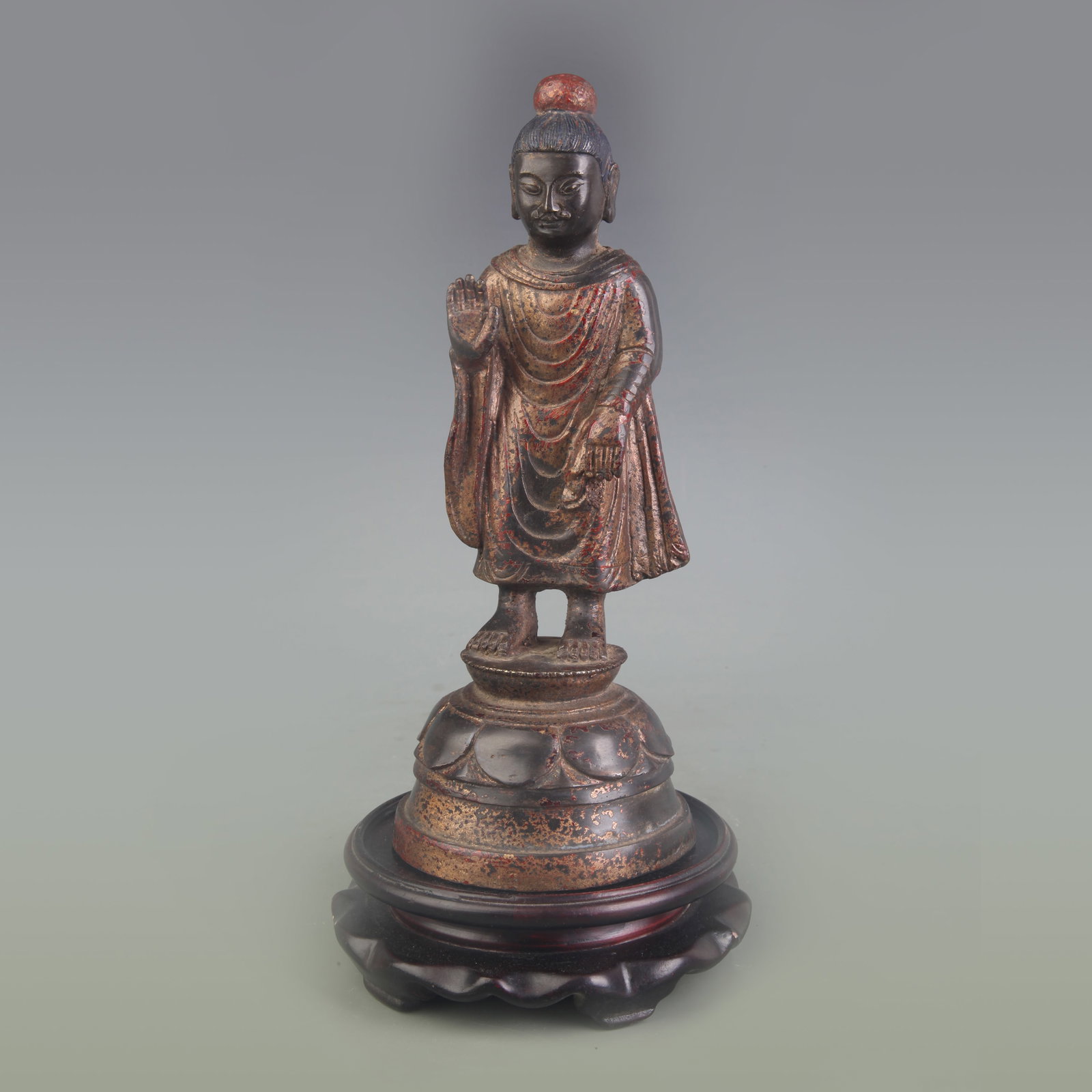 A FINE BRONZE SHAKYAMUNI BUDDHA STATUE: Qing Dynasty; Width: 3.8 inch; High:9.3 inch; Wooden base for picture and display only.
