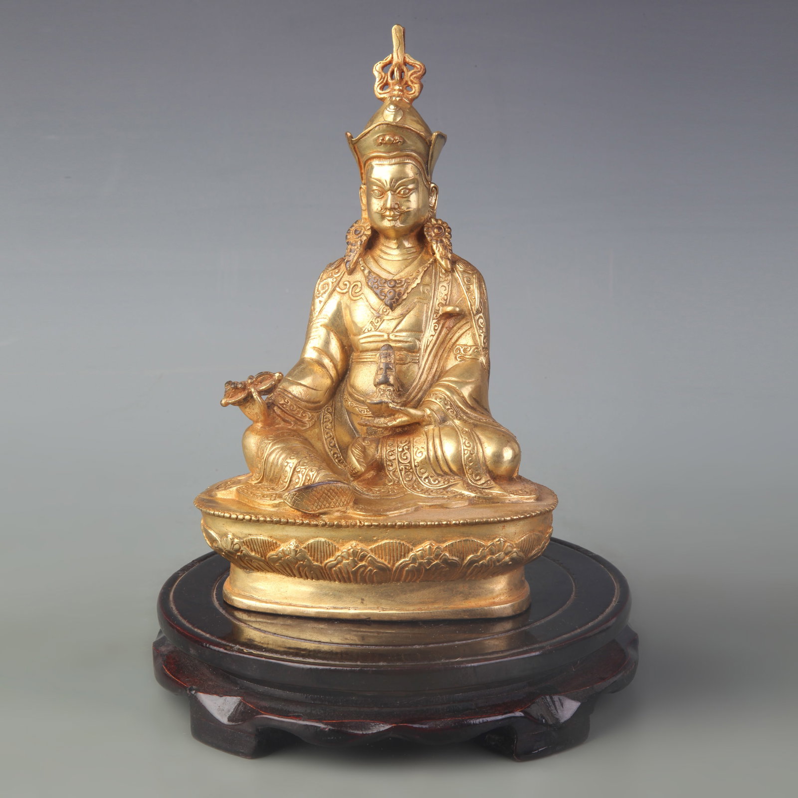 A FINE BRONZE OF PADMASAMBHAVA GURU RINPOCHE: Qing Dynasty; High:7.8 inch; Wooden base for picture and display only.
