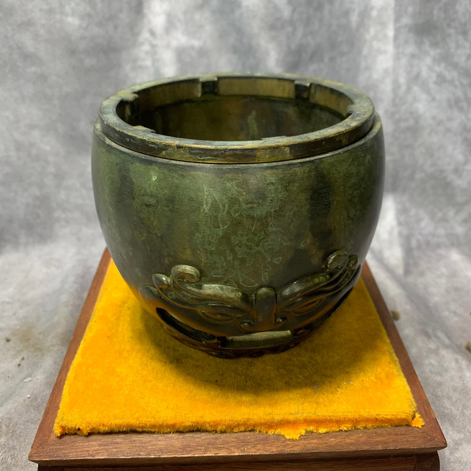 A FINE BRONZE CENSER WITH BEAST FACE PATTERNS: Qing Dynasty; High: 4.1 inch; Diameter: 5.1 inch; Wooden base for picture and display only.