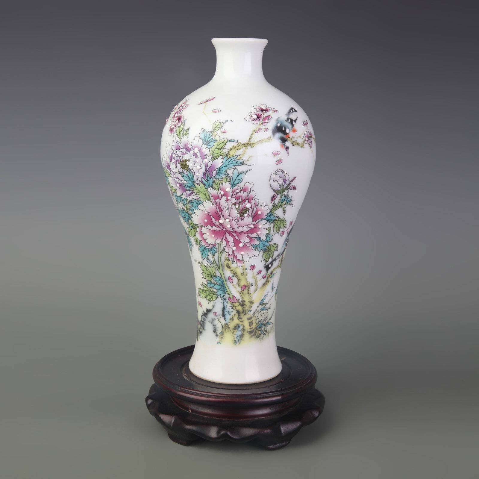 A FAMILLE ROSE MEIPING VASE WITH BIRD-AND-FLOWER MOTIF: Qing Dynasty; Diameter: 2.7 inch; High: 9.2 inch; Wooden base for picture and display only.