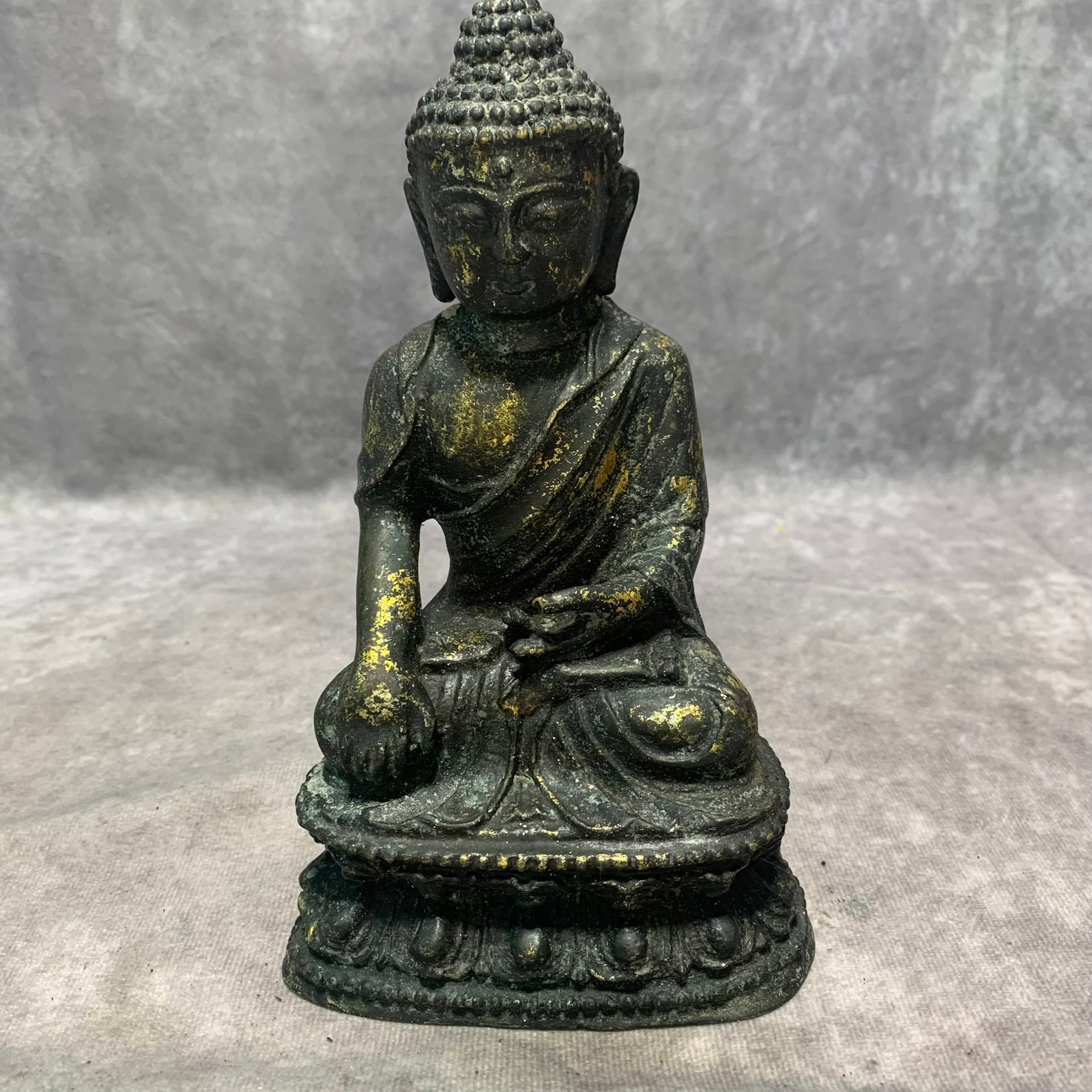 QING DYNASTY BRONZE SHAKYAMUNI BUDDHA STATUE: Qing Dynasty; Long: 4.2 inch; Width: 2.9 inch; High: 7.3 inch. Wooden base for picture and display only.