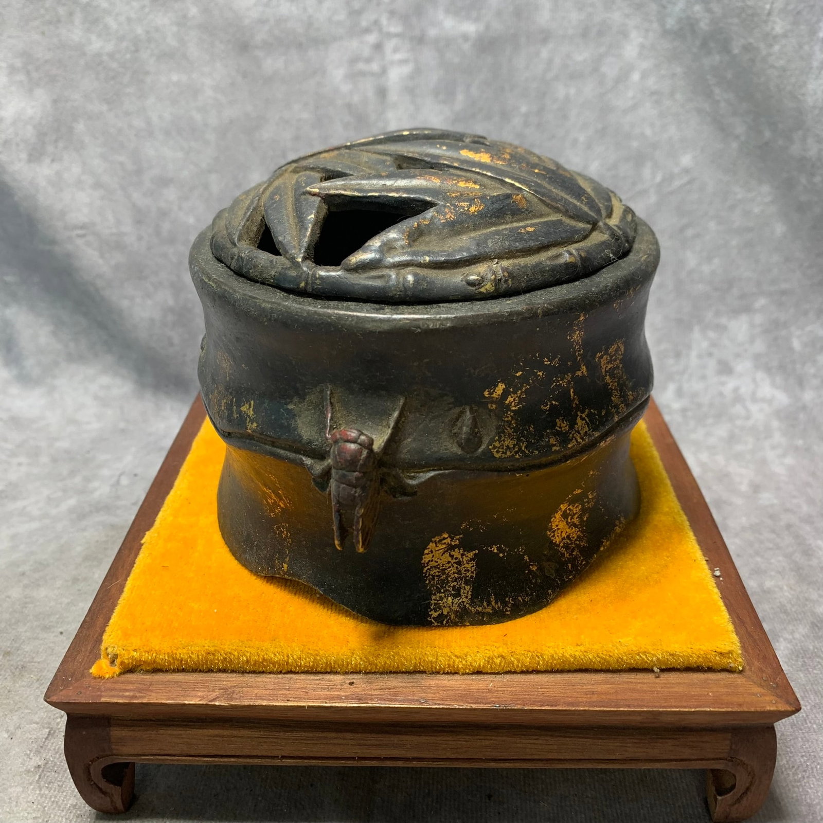 A FINE GILDED BRONZE CICADA-EAR BAMBOO INCENSE BURNER: Ming Dynasty Style; High: 4.4 inch; Diameter: 5.1 inch. Wooden base for picture and display only.