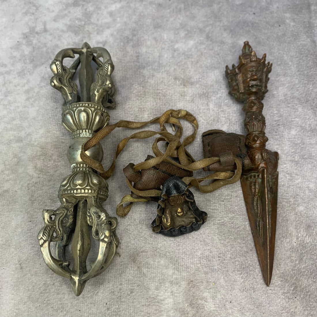 GROUP OF TIBETAN BUDDHISM RITUAL INSTRUMENTS: 20th Century; High: 5.7 inch; High: 5.7 inch; High: 1.5 inch. Wooden base for picture and display only.