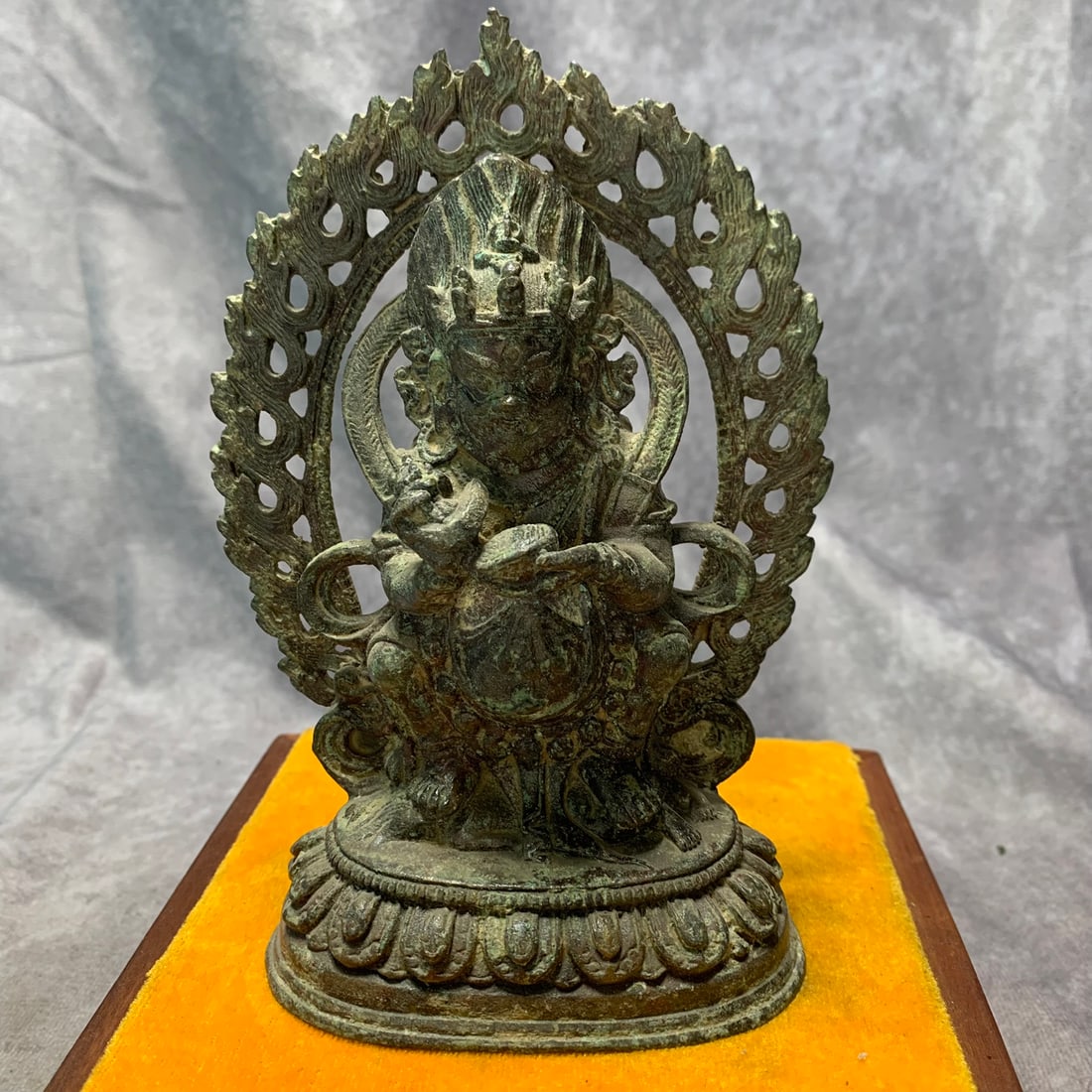 A FINETIBETAN BRONZE MAHAKALA FIGURE: Qing Dynasty; Long: 4.5 inch; Width: 2.5 inch; High: 6.6 inch. Wooden base for picture and display only.