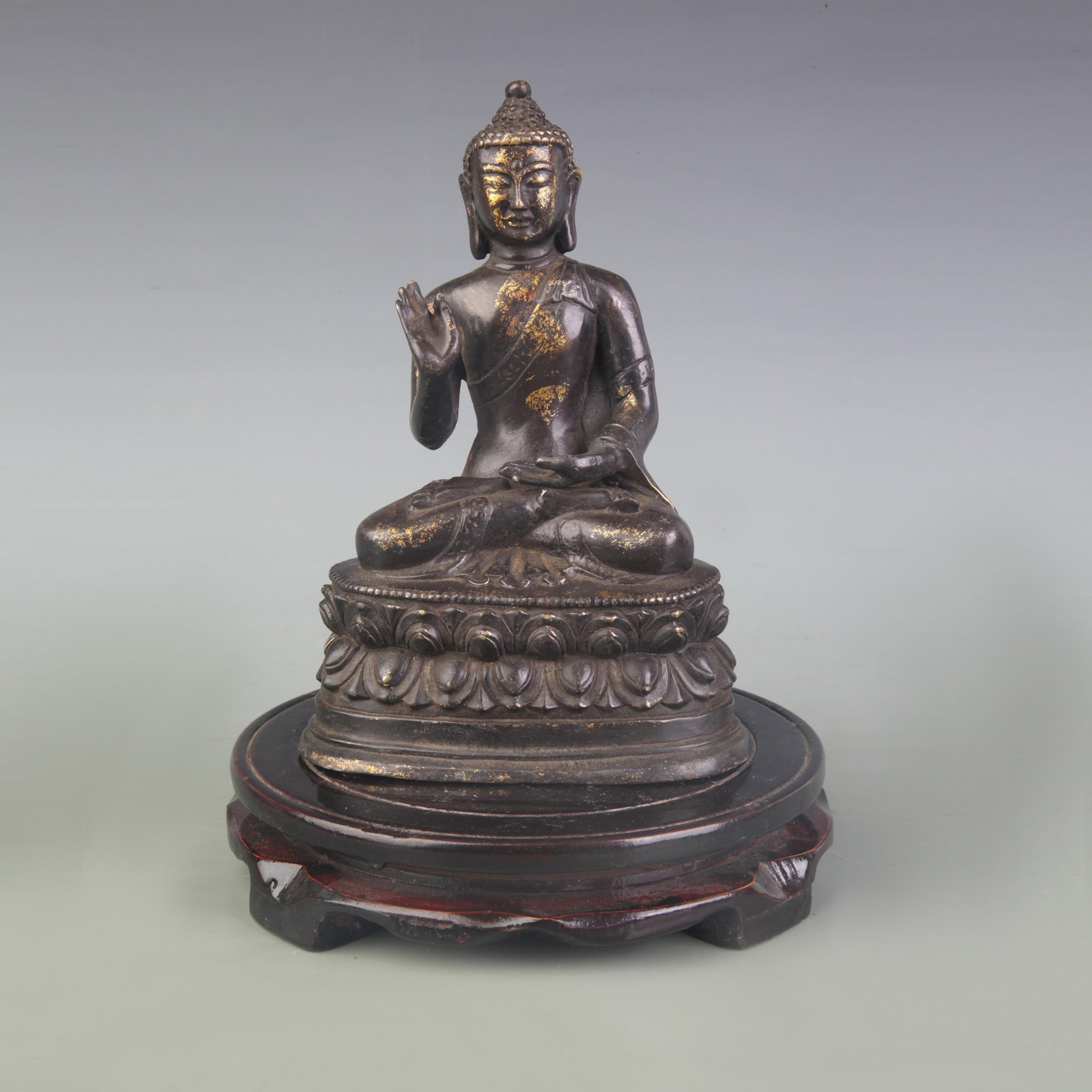 A FIGURE OF BRONZE TATHAGATA BUDDHA: Qing Dynasty; High: 7.1 inch; Wooden base for picture and display only.