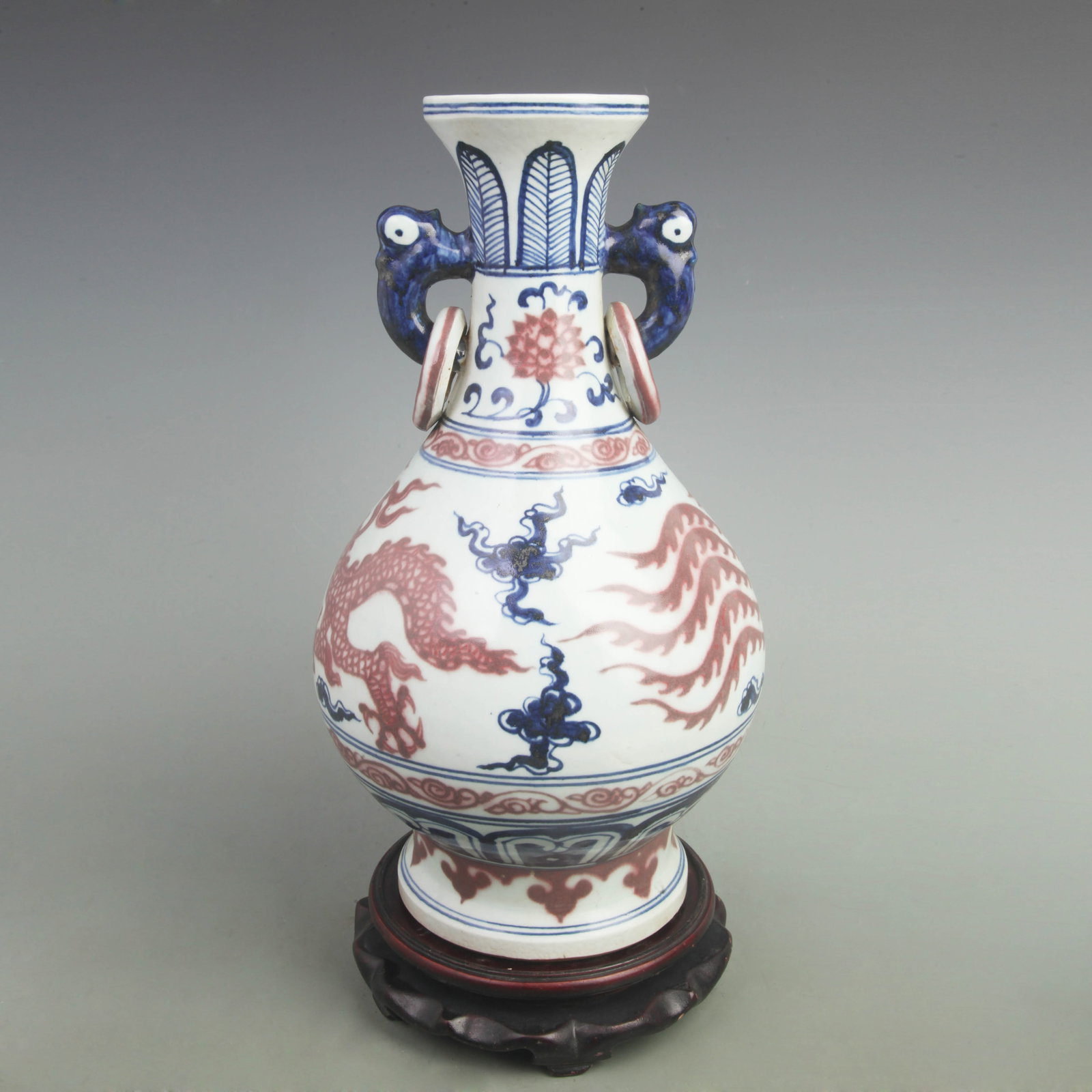 BLUE AND WHITE VASES WITH UNDERGLAZE RED DRAGON AND PHOENIX VASE: Ming Dynasty Style; Xuan De Period: High: 14.5 inch; Width: 8.5 inch. Wooden base for picture and display only.