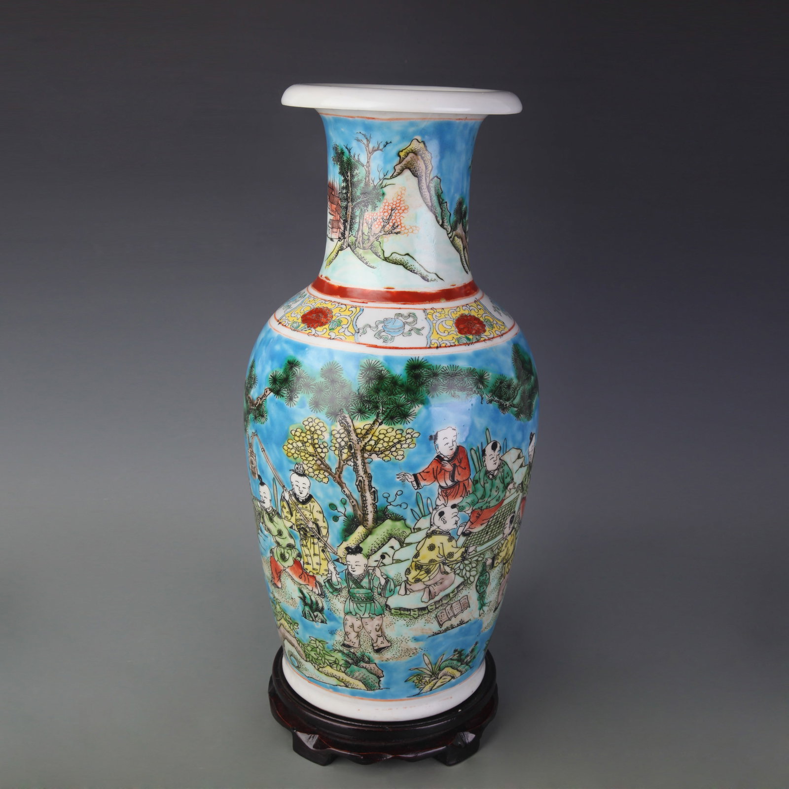 A FAMILLE ROSE BLUE-GROUND VASE WITH FIGURAL DECORATION: Qing Dynasty; High: 17.0 inch; Wooden base for picture and display only.