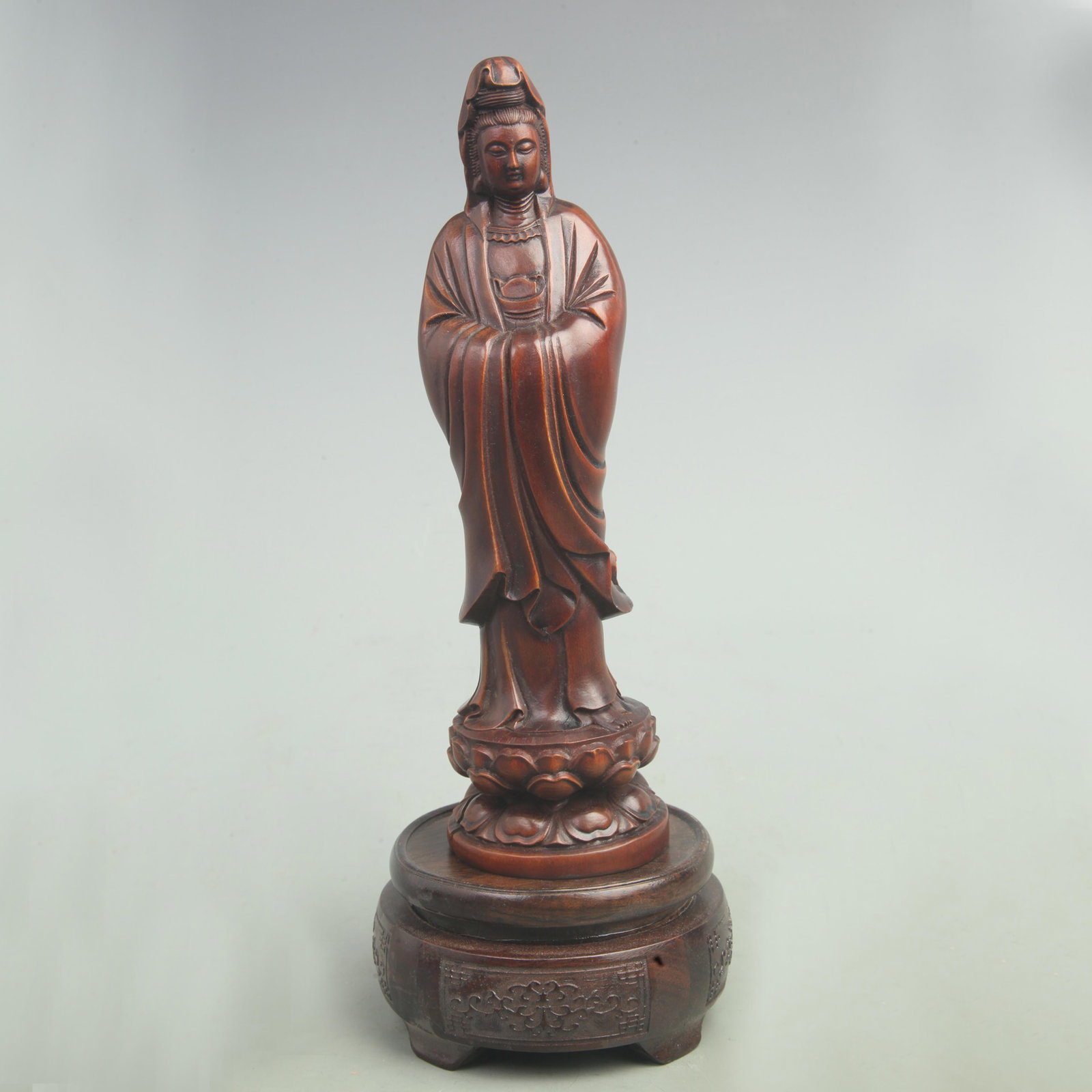 A FINE BOXWOOD MADE GUAN YIN FIGURE: 20th Century, High: 8.3 inch; Width: 2.4 inch. Wooden base for picture and display only.