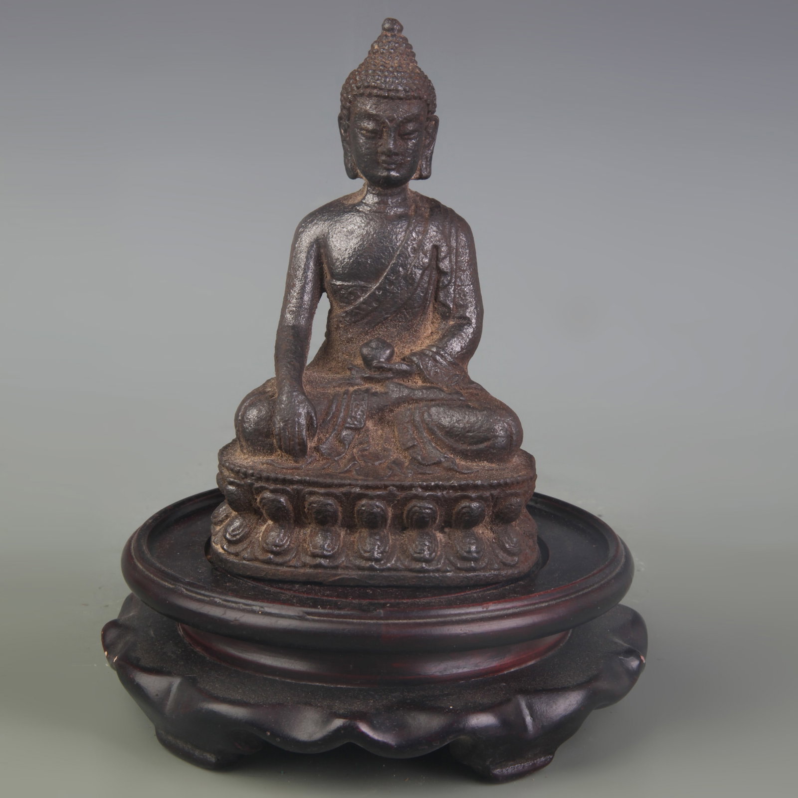 CAST IRON SHAKYAMUNI BUDDHA STATUE: Qing Dynasty; High: 4.9 inch; Wooden base for picture and display only.