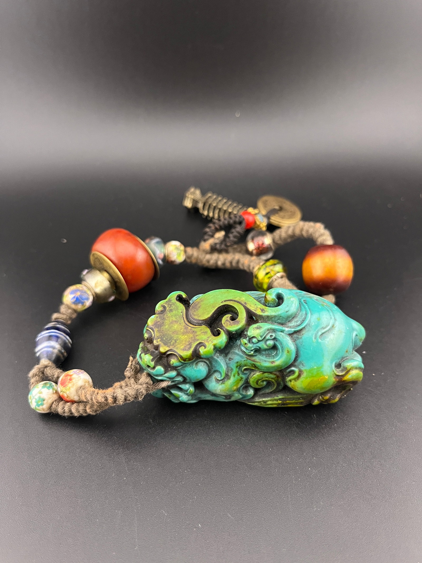 A FINE TURQUOISE MADE PIXIU STYLE AMULET: 20th Century; Long: 12 inch?Long: 2.8 inch; Width: 1.4 inch; High: 1.4 inch
