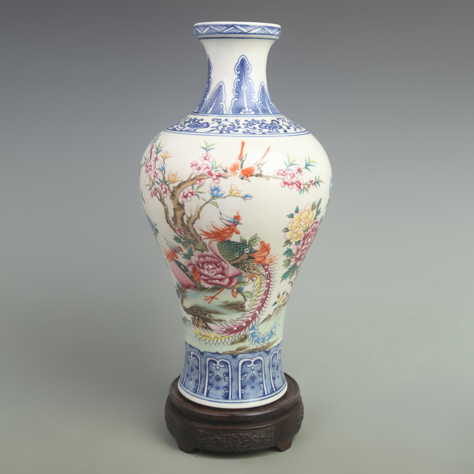 FAMILLE-ROSE BLUE-AND-WHITE 'WELCOMING THE MOON' PORCELAIN VASE: Qing Dynasty Yong Zhen Period; High: 14 inch; Width: 8 inch; Wooden base for picture and display only.