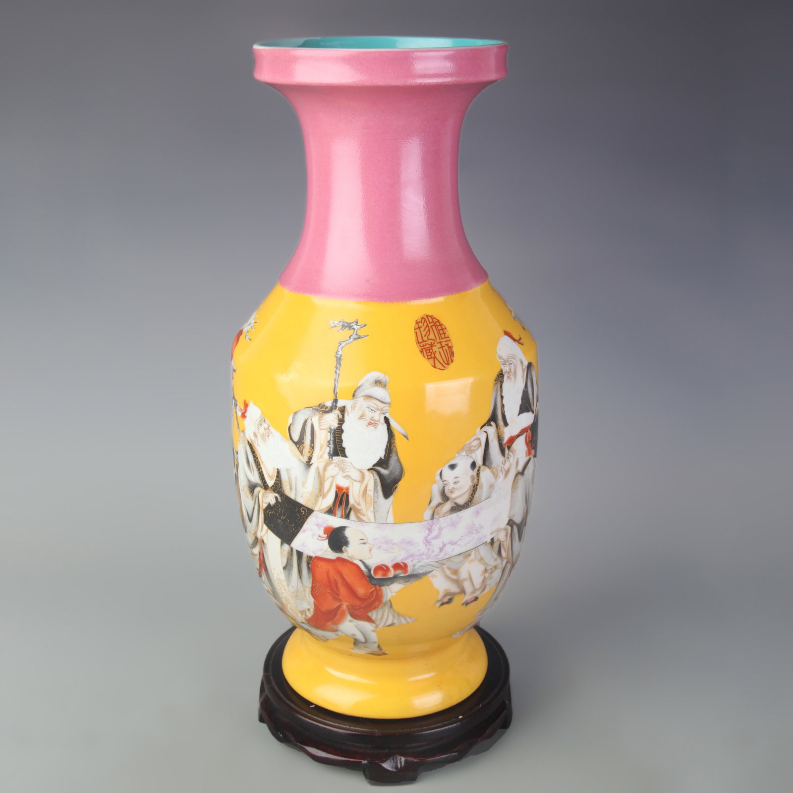 FAMILLE ROSE YELLOW-GROUND VASE WITH FIGURE PATTERNS: Qing Dynasty Qian Long Period; High: 16.7 inch; Wooden base for picture and display only.