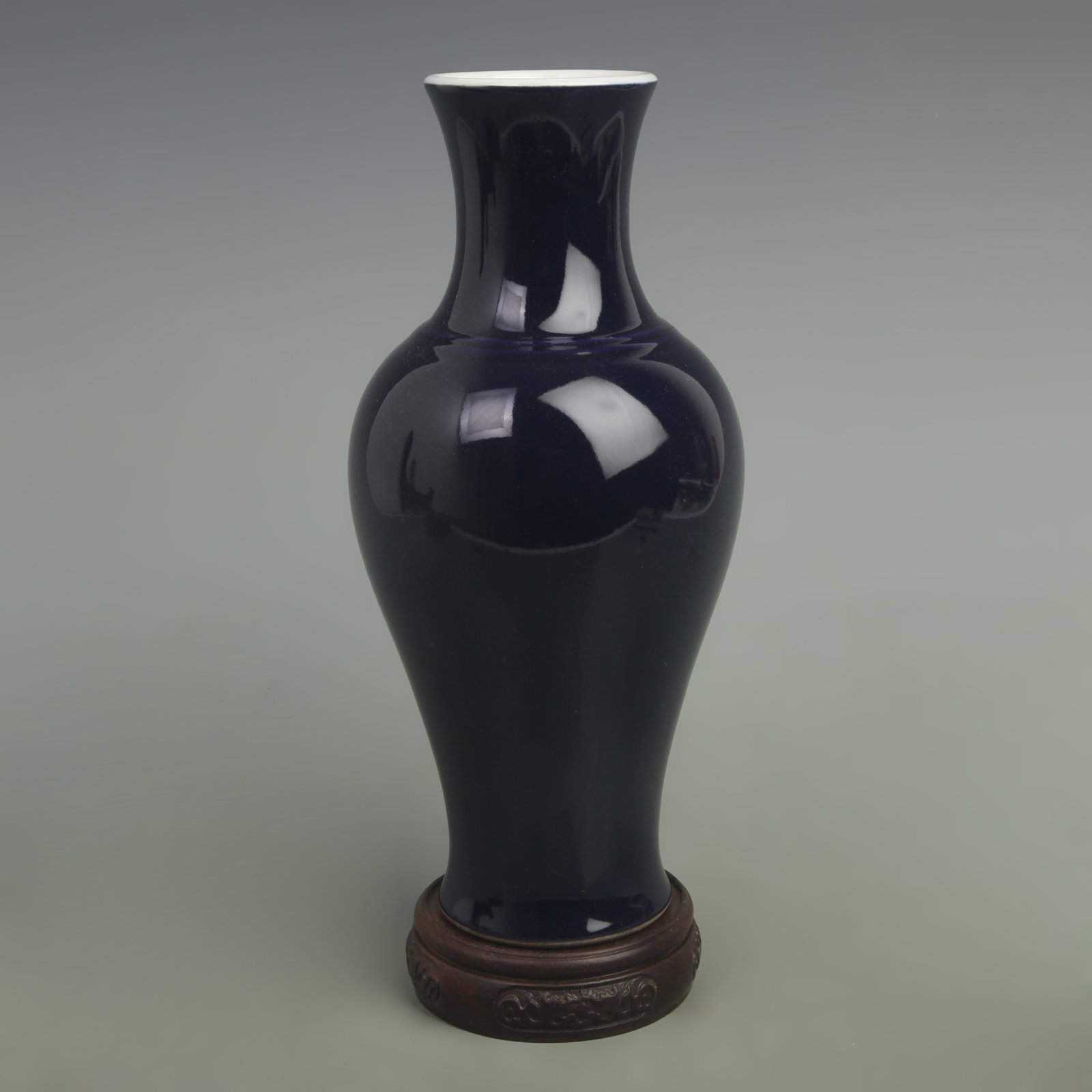 A POWDER-BLUE GLAZED GUANYIN VASE: Qing Dynasty Qian Long Period: High: 10.5 inch; Width: 5.5 inch; Wooden base for picture and display only.