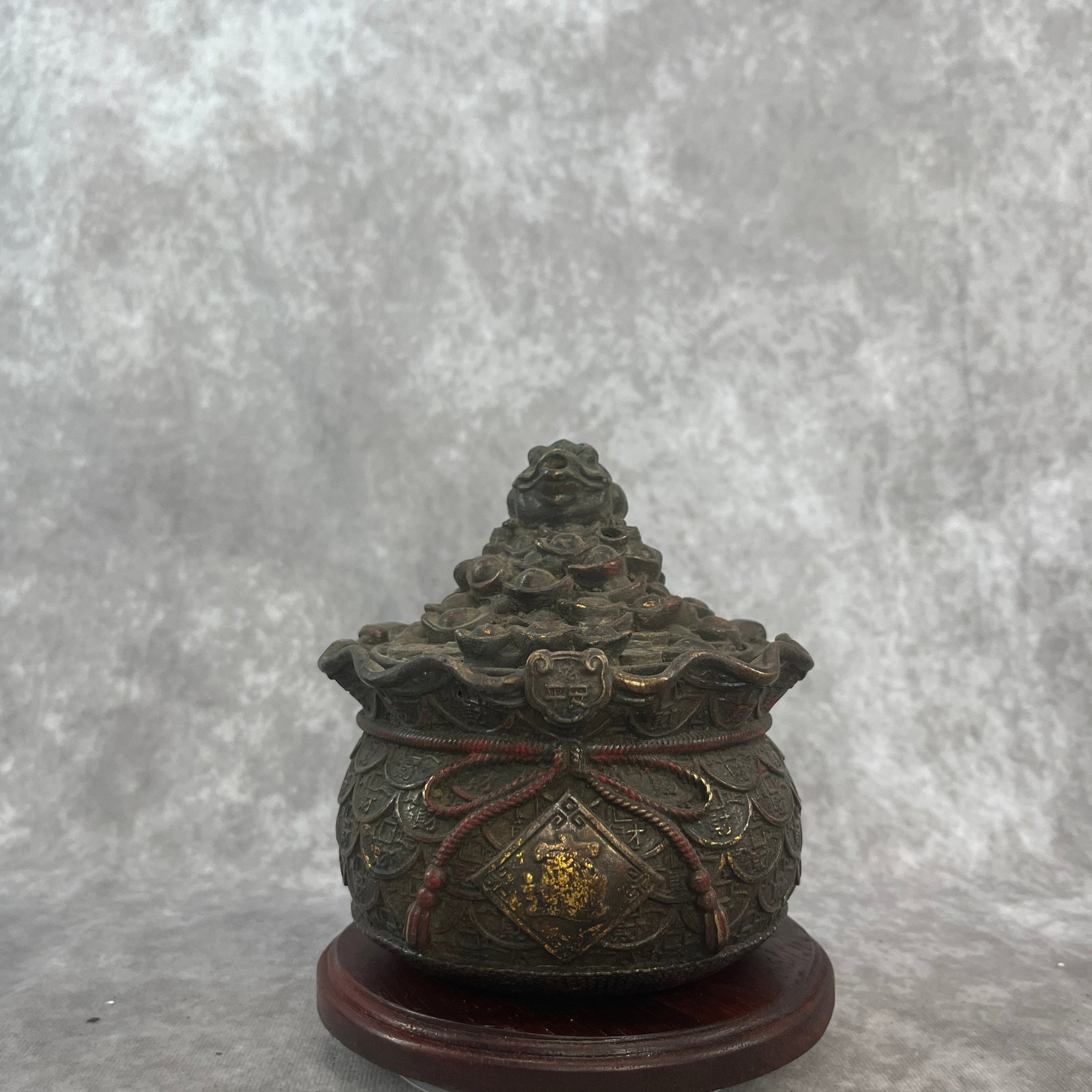 A FINE "TREASURE BOWL" (ZHAO CAI JIN BAO) BRONZE INCENSE BURNER: Republic Period; High: 5.4 inch; Diameter: 5 inch. Wooden base for picture and display only.