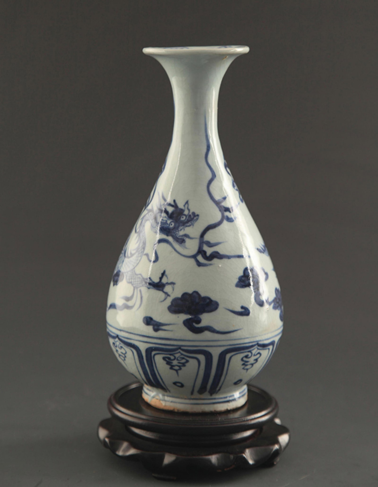 BLUE AND WHITE DRAGON PATTERN YU HU CHUN BOTTLE: Yuan Dynasty Style; High: 9.0 inch; Diameter: 2.75 inch. Wooden base for picture and display only.