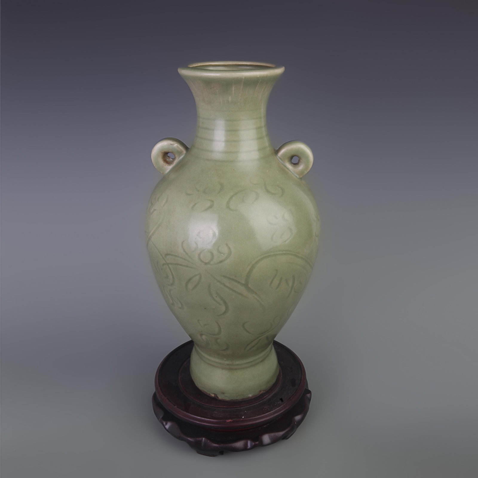 LONGQUAN KILN CARVED FLORAL PATTERN DOUBLE-EARED VASE: Ming Dynasty Style; Diameter: 6.6 inch; High: 14.3 inch; Wooden base for picture and display only.