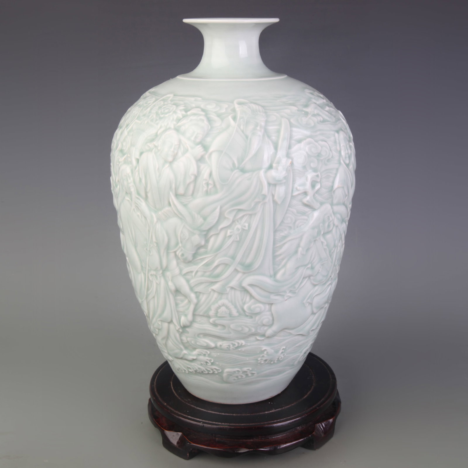 BEAN-GREEN GLAZED CARVED FIGURE PATTERN MEIPING VASE: Qing Dynasty Qian Long Period; High: 12.7 inch; Wooden base for picture and display only.