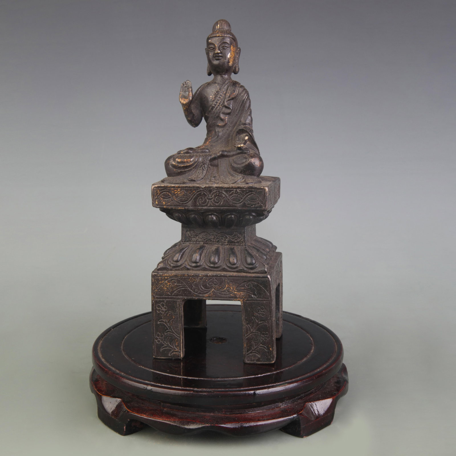 A FINE BRONZE SHAKYAMUNI BUDDHA STATUE: Qing Dynasty; High: 8.5 inch. Wooden base for picture and display only.
