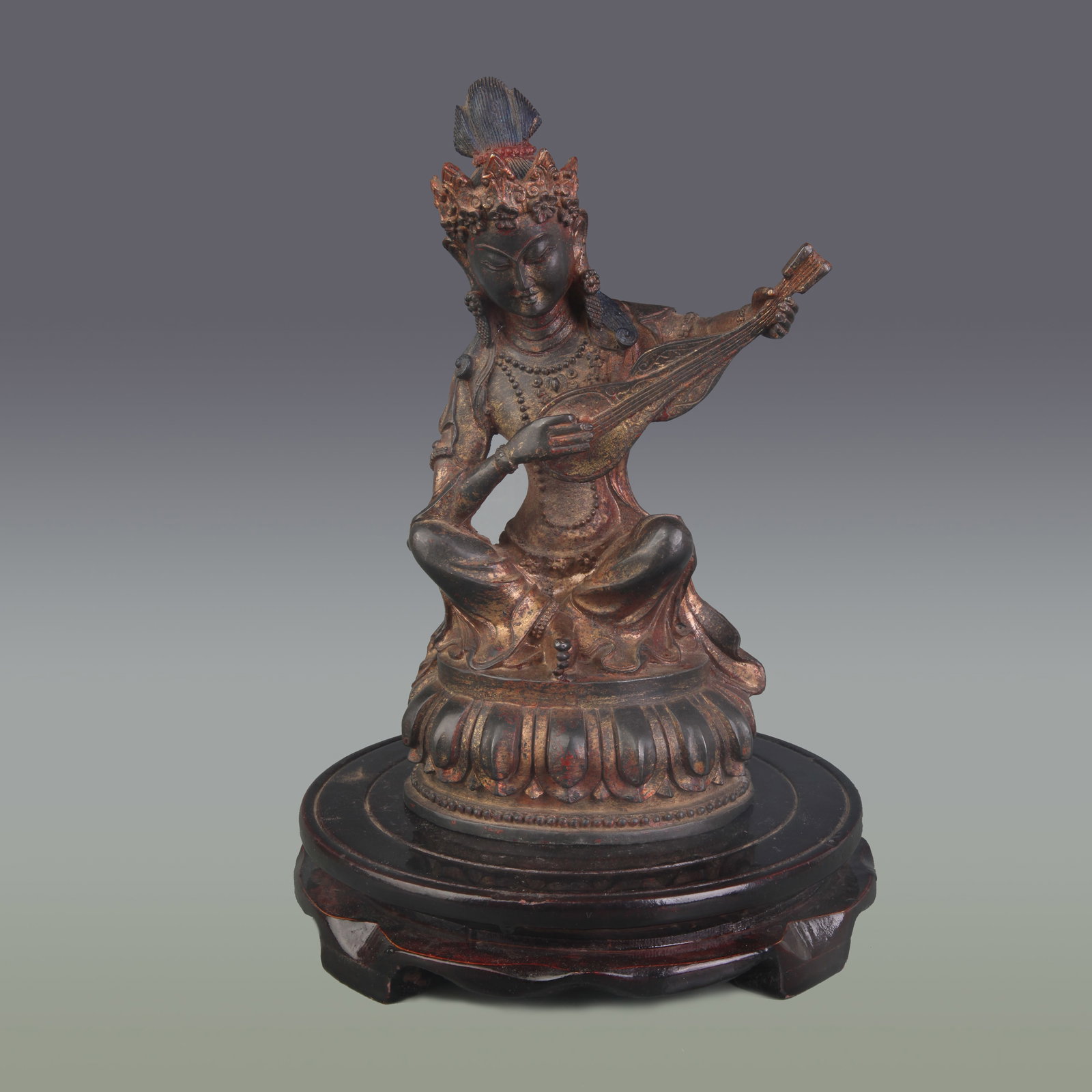 A FIGURE OF SARASWATI BODDHA: 19th Century; Width: 4.2 inch; High: 8.8 inch; Wooden base for picture and display only.