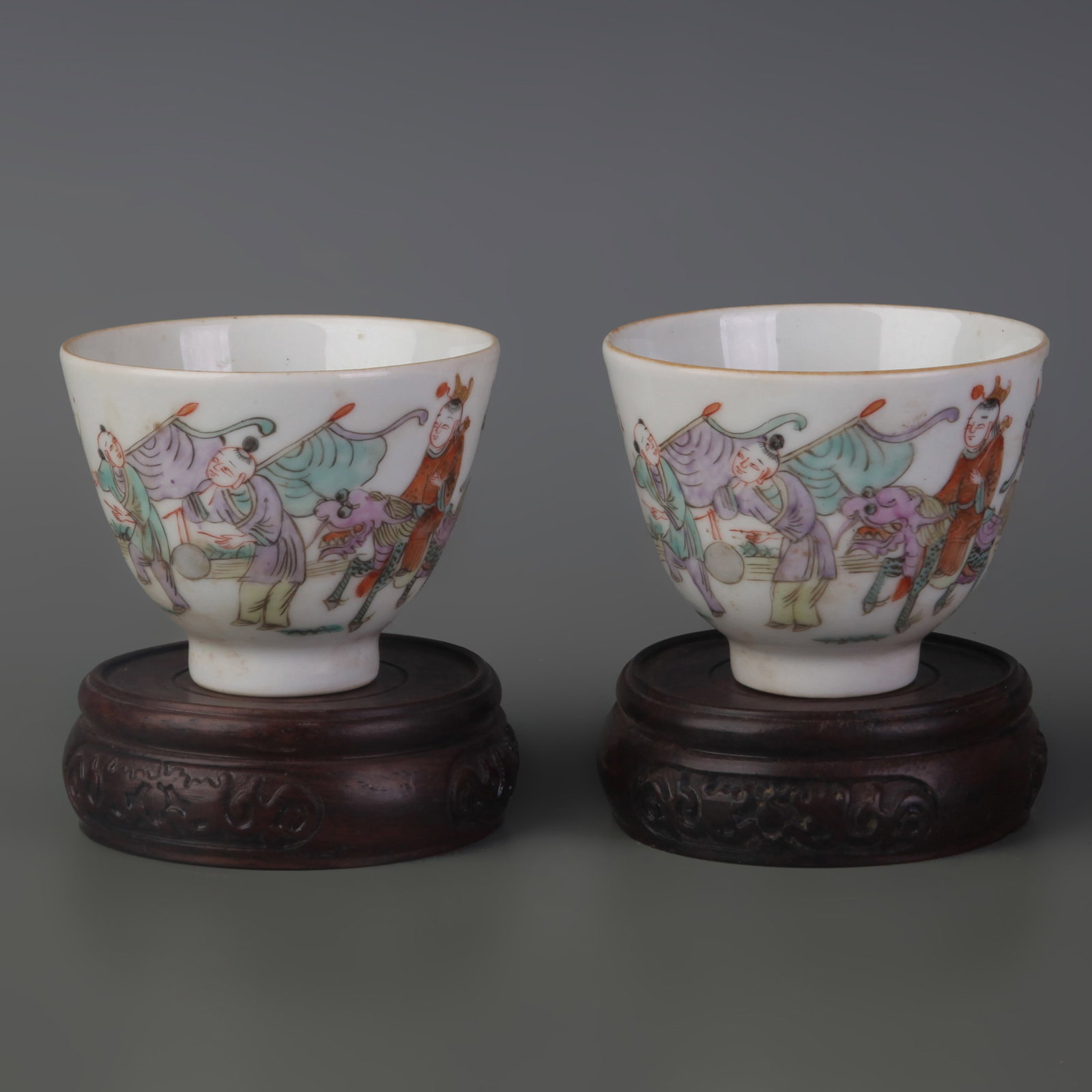 PAIR OF FAMILLE ROSE SMALL BOWLS WITH FIGURATIVE DESIGN: Qing Dynasty Tong Zhi Period; Diameter: 2.9in ; High: 2.3in; Wooden base for picture and display only.