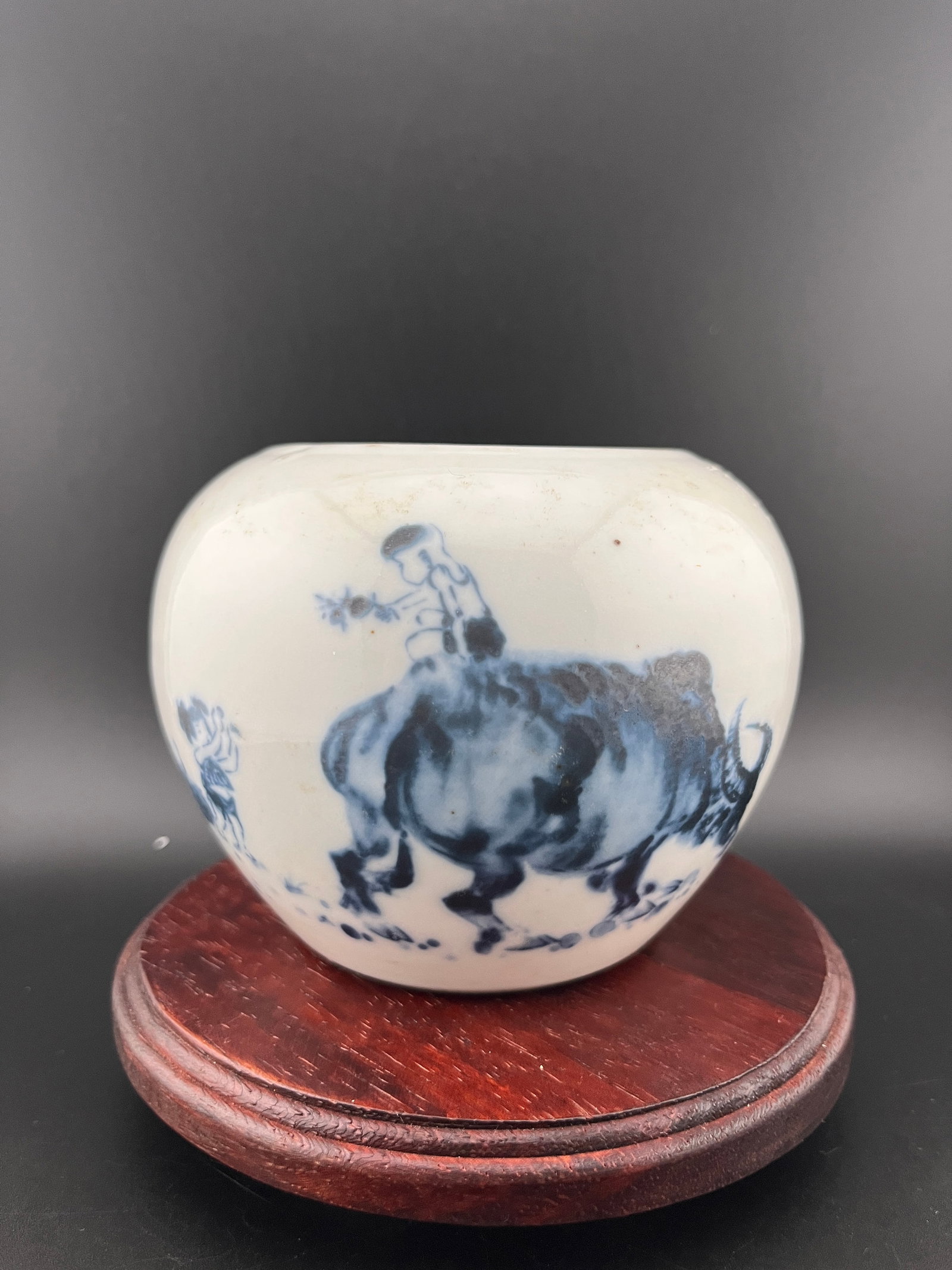 A FINE BLUE AND WHITE COW PAINTED WATER JAR: Republic Period; High: 3.4 inch; Diameter: 4.6 inch. Wooden base for picture and display only.