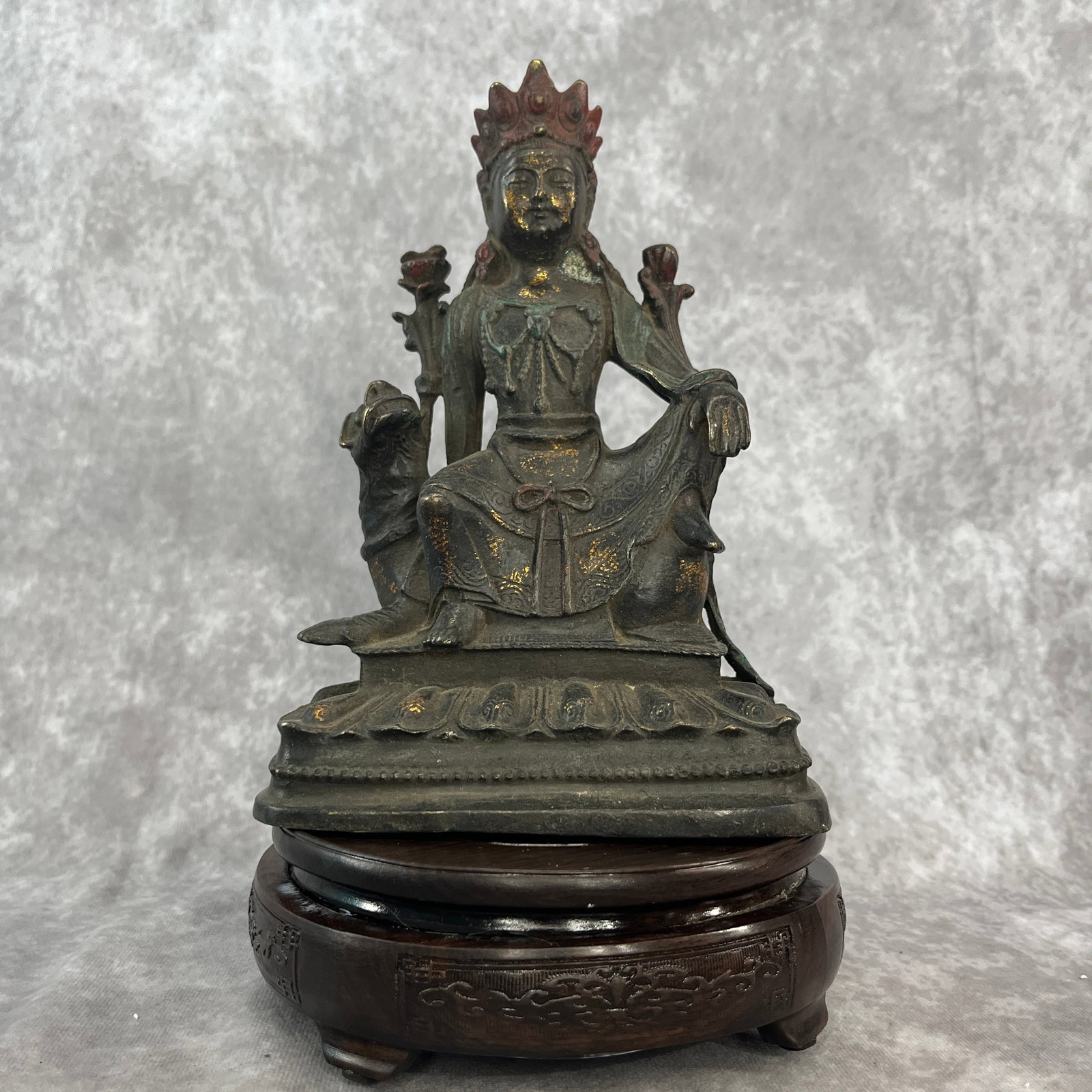 A FINE BRONZE MANJUSHRI BODHISATTVA STATUE: 19th Century; Long: 6.1 inch; Width: 4.1 inch; High: 8.9 inch. Wooden base for picture and display only.