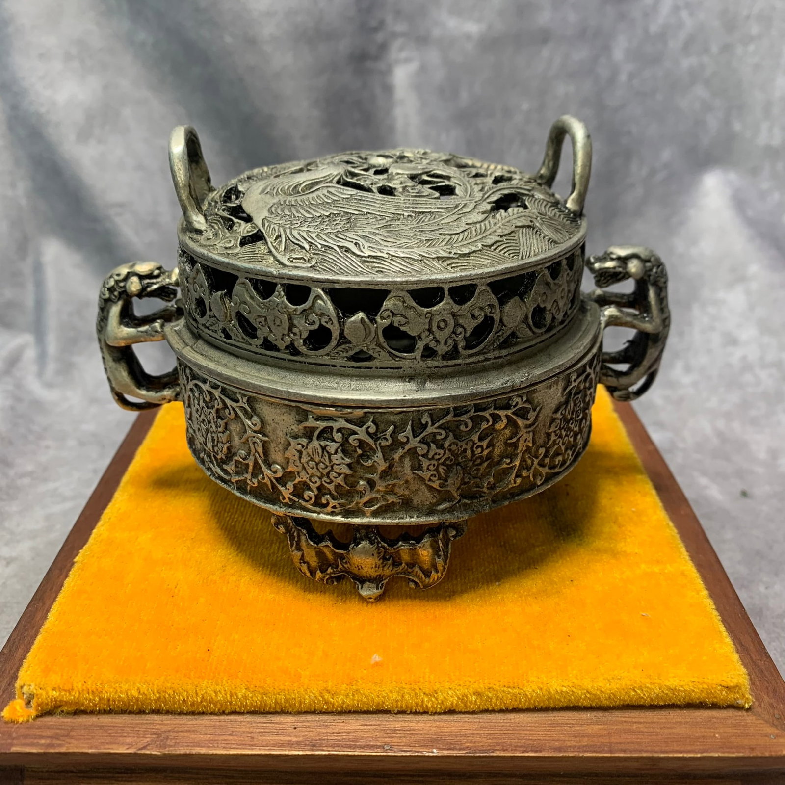A QIANLONG MARKED SILVER-GILT BRONZE CENSER WITH DRAGON AND PHOENIX MOTIFS: Qing Dynasty; High: 3.7 inch; Diameter: 5.4 inch; Wooden base for picture and display only.