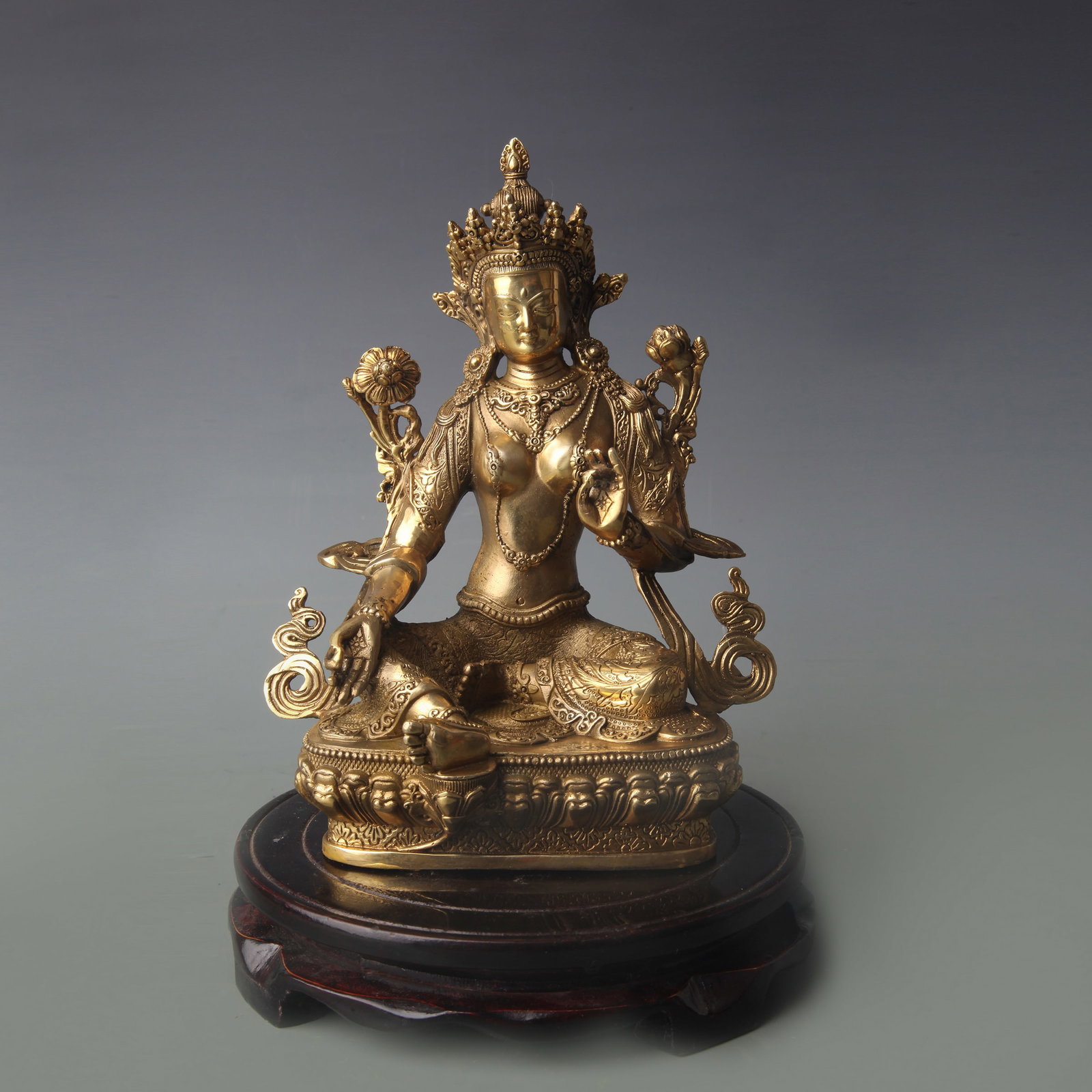 A FINE BRONZE FIGURE OF GREEN TARA: Qing Dynasty; High: 8.1 inch; Wooden base for picture and display only.