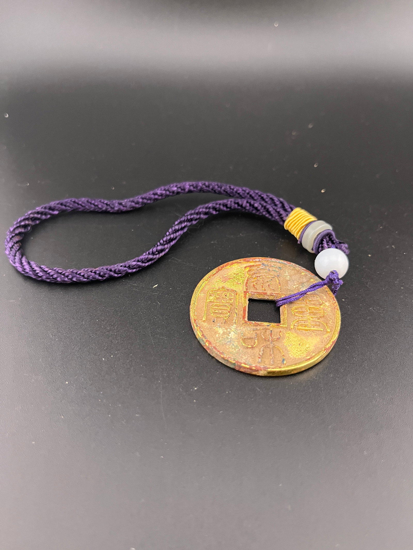 A FINE CHINESE DAO GUANG TONG BAO CHINESE COIN CHARM: Modern; Long: 8.1 inch; Width: inch; High: 1.8 inch. Wooden base for picture and display only.