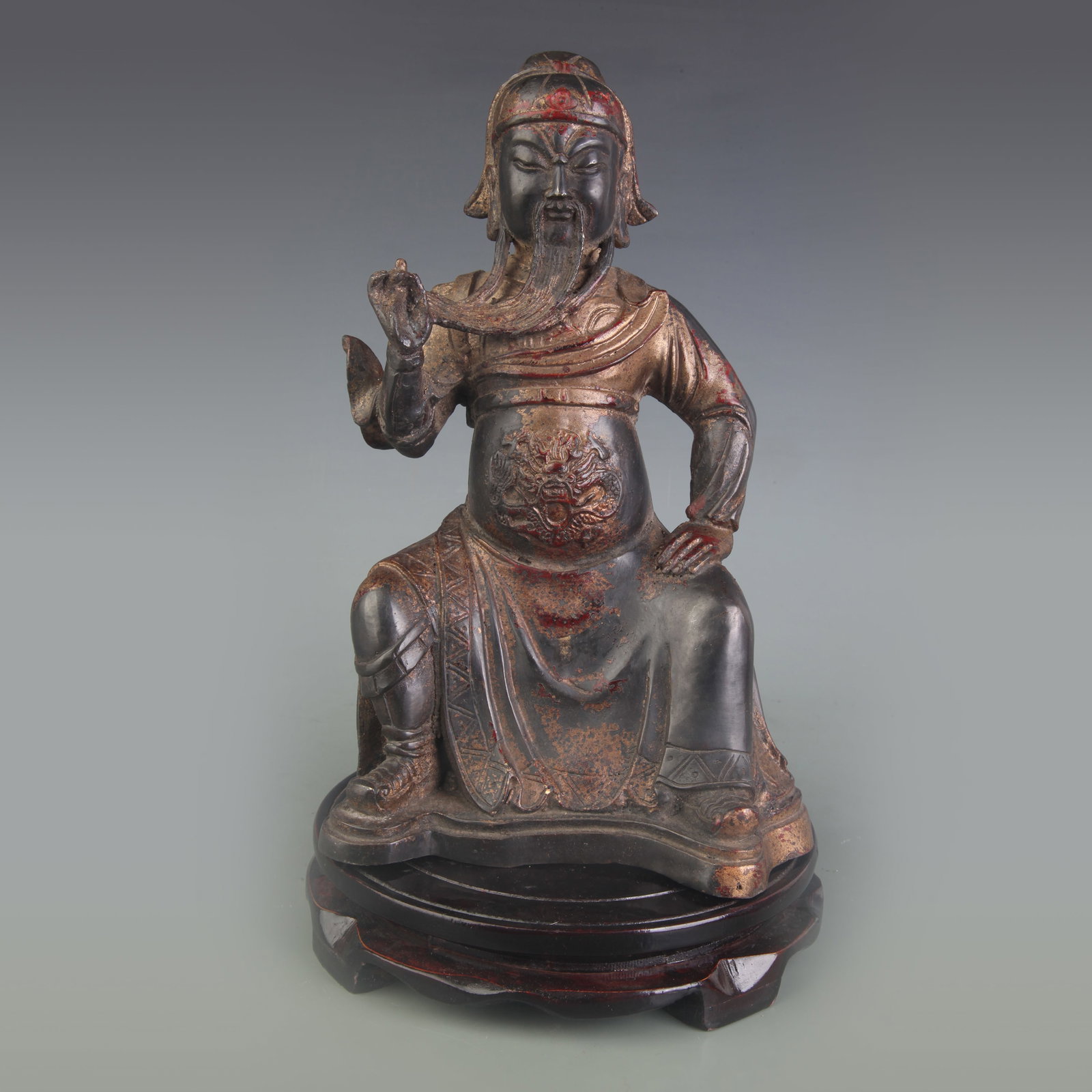 BRONZE SEATED STATUE OF GUAN YU: Qing Dynasty; Width:6.2 inch; High: 10.5 inch; Wooden base for picture and display only.