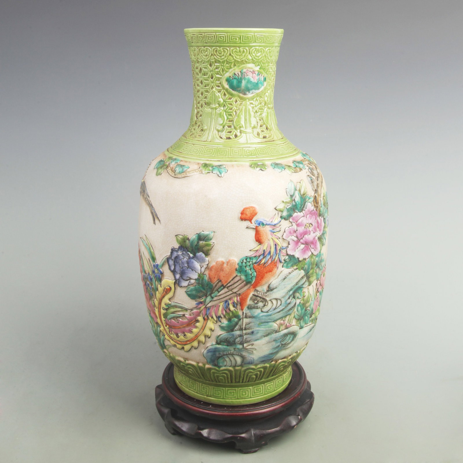 FAMILLE ROSE FLOWER AND BIRD PATTERN GUAN YIN STYLE BOTTLE: Qing Dynasty Qian Long Period; High: 15.7 inch; Width: 8 inch. Wooden base for picture and display only.