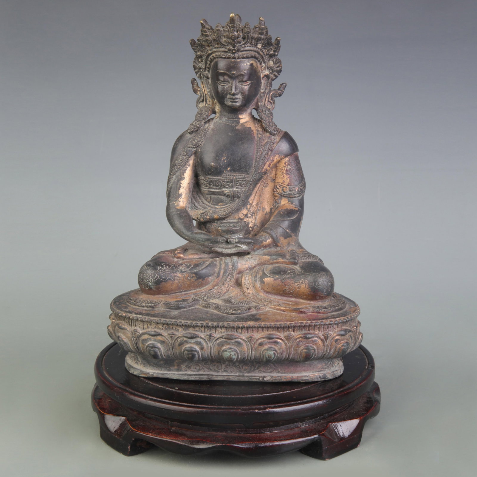 A FINE BRONZE BODHISATTVA STATUE: Qing Dynasty; High: 8.2 inch. Wooden base for picture and display only.